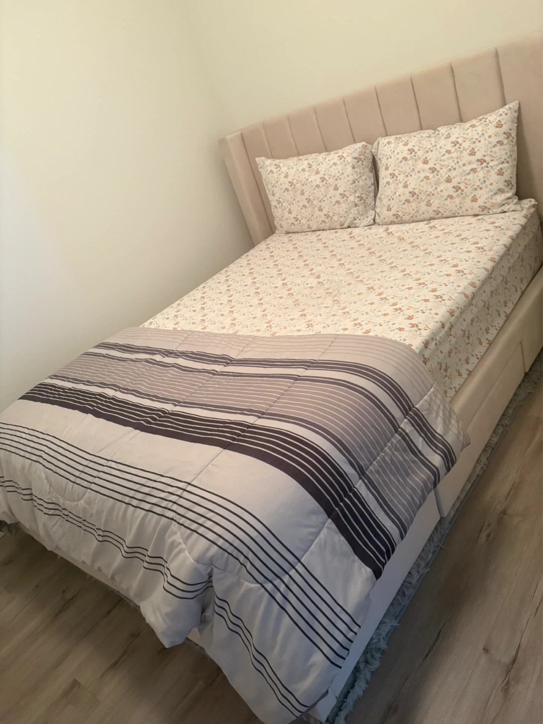 Beautiful queen-size upholstered bed with mattress included.