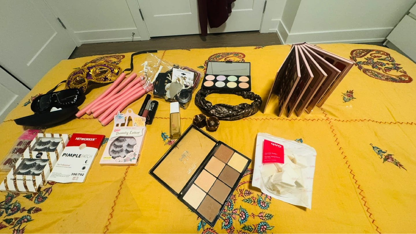 Assorted Makeup Palettes and Beauty Tools