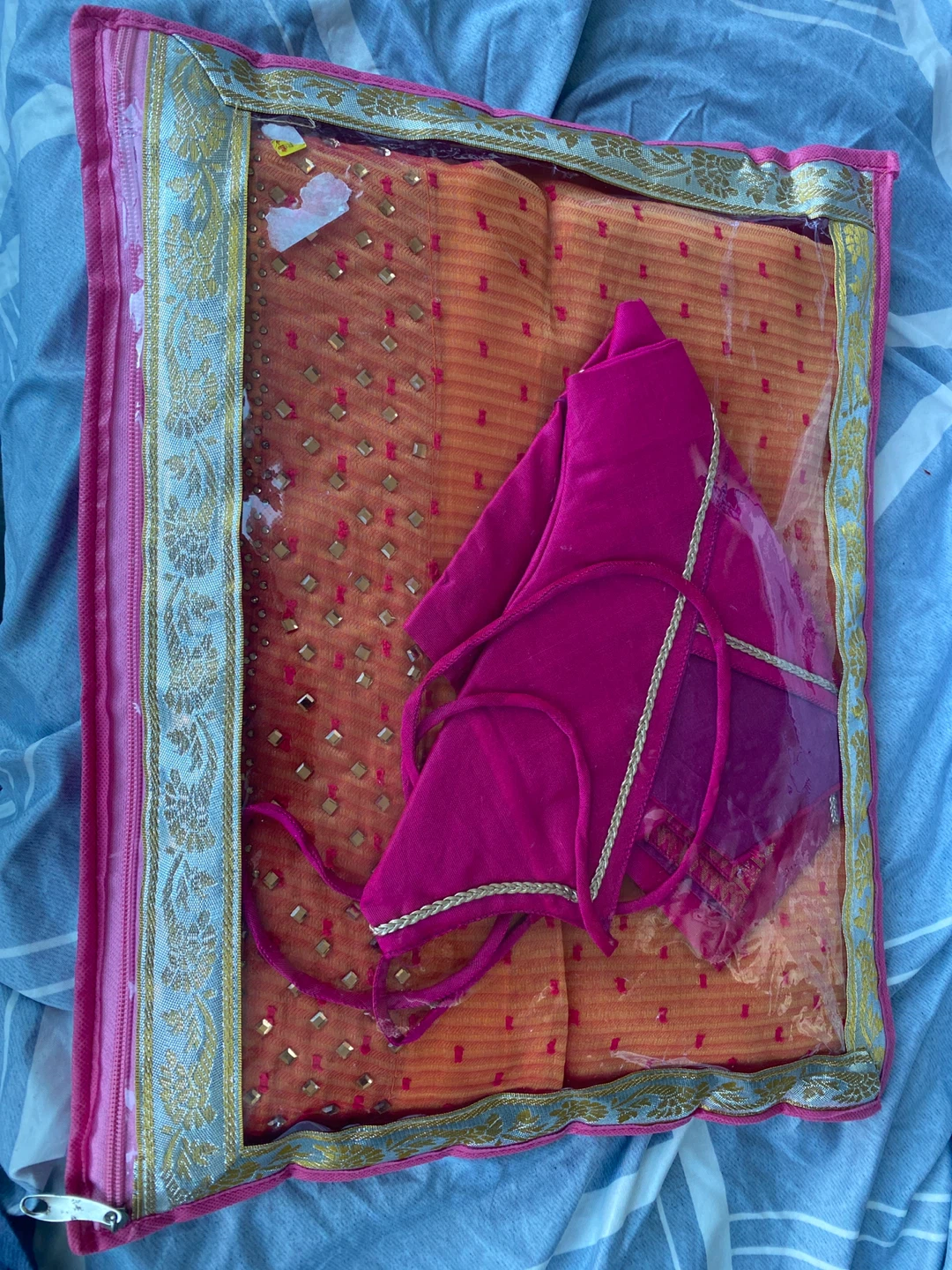 Bright Pink Saree Blouse with Cover to safely store