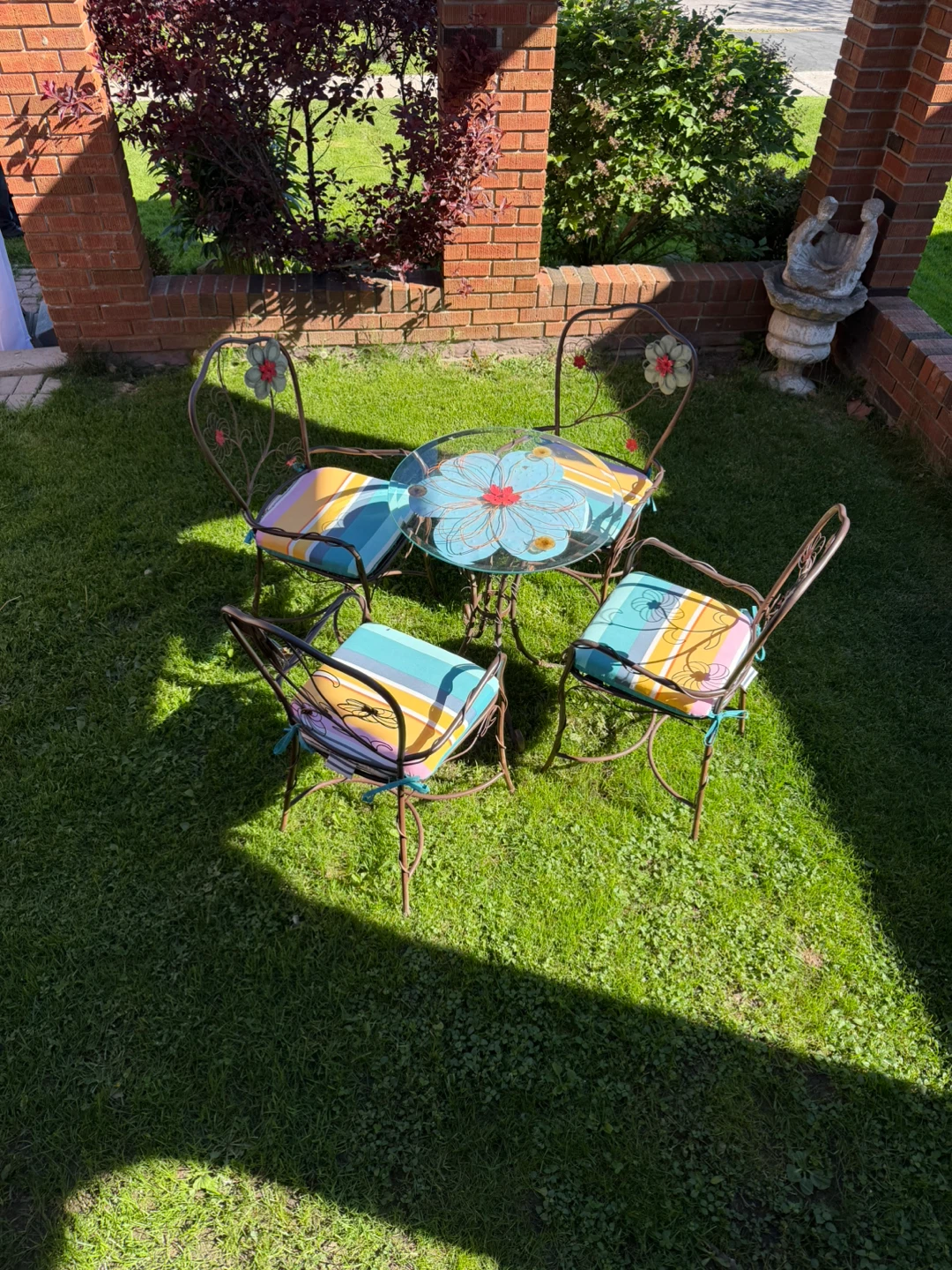 Metal patio set with 4 chairs and table