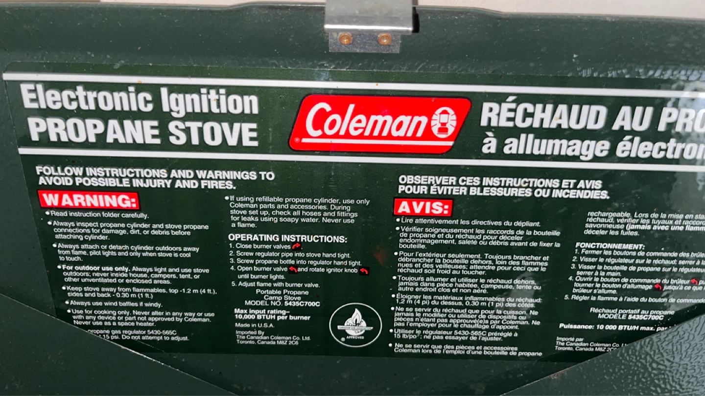 Coleman Two-Burner Propane Stove and propane tank