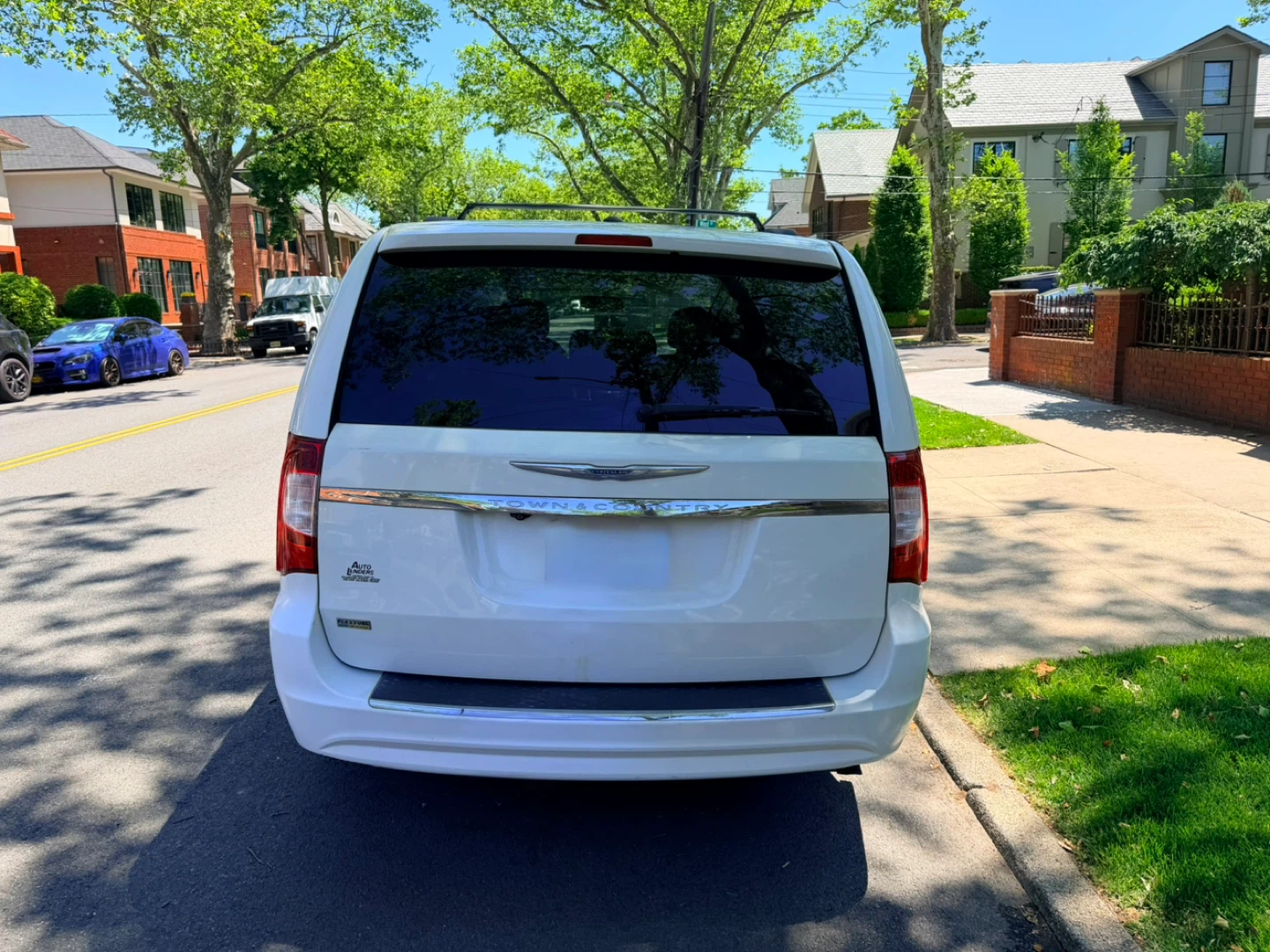 White Chrysler Town & Country Minivan - photo 4