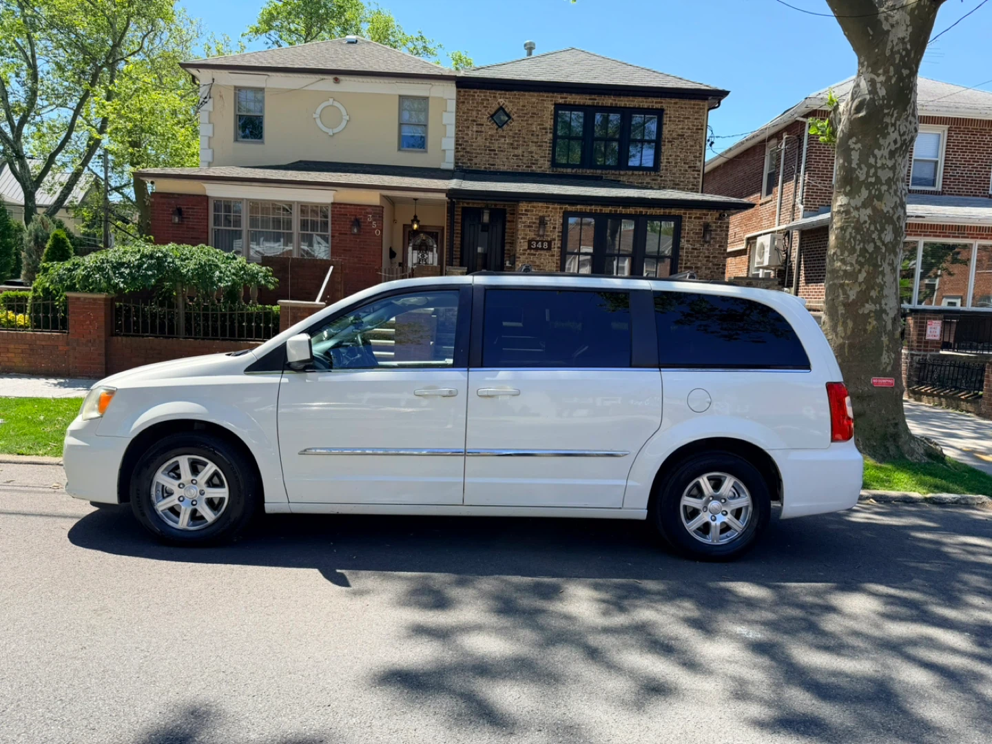 White Chrysler Town & Country Minivan - photo 2