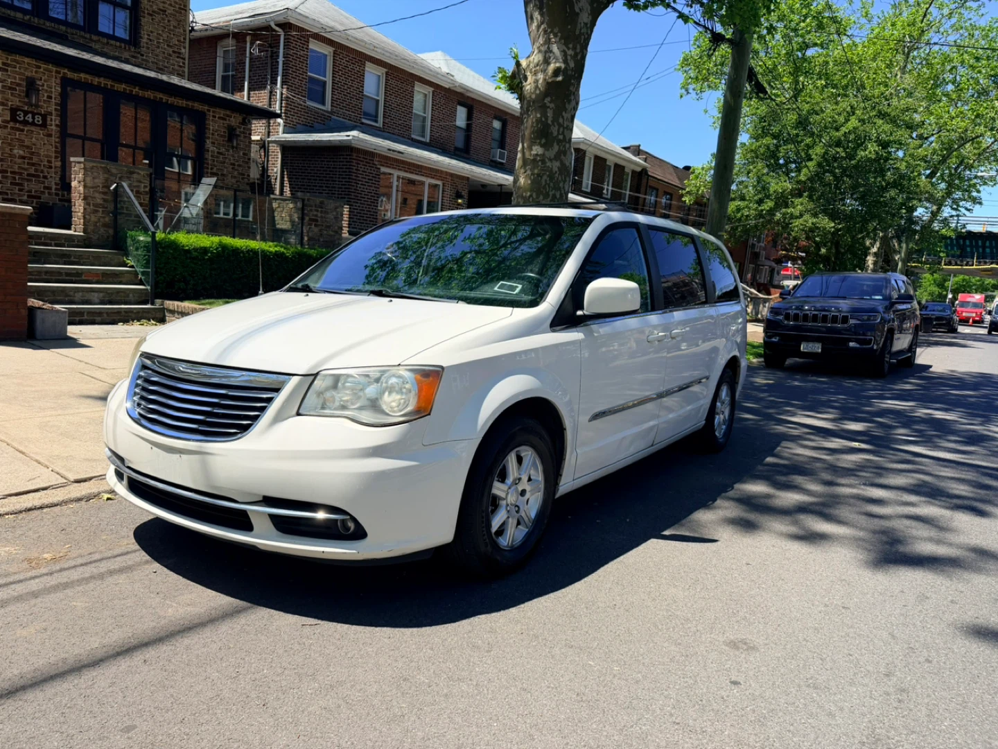 White Chrysler Town & Country Minivan