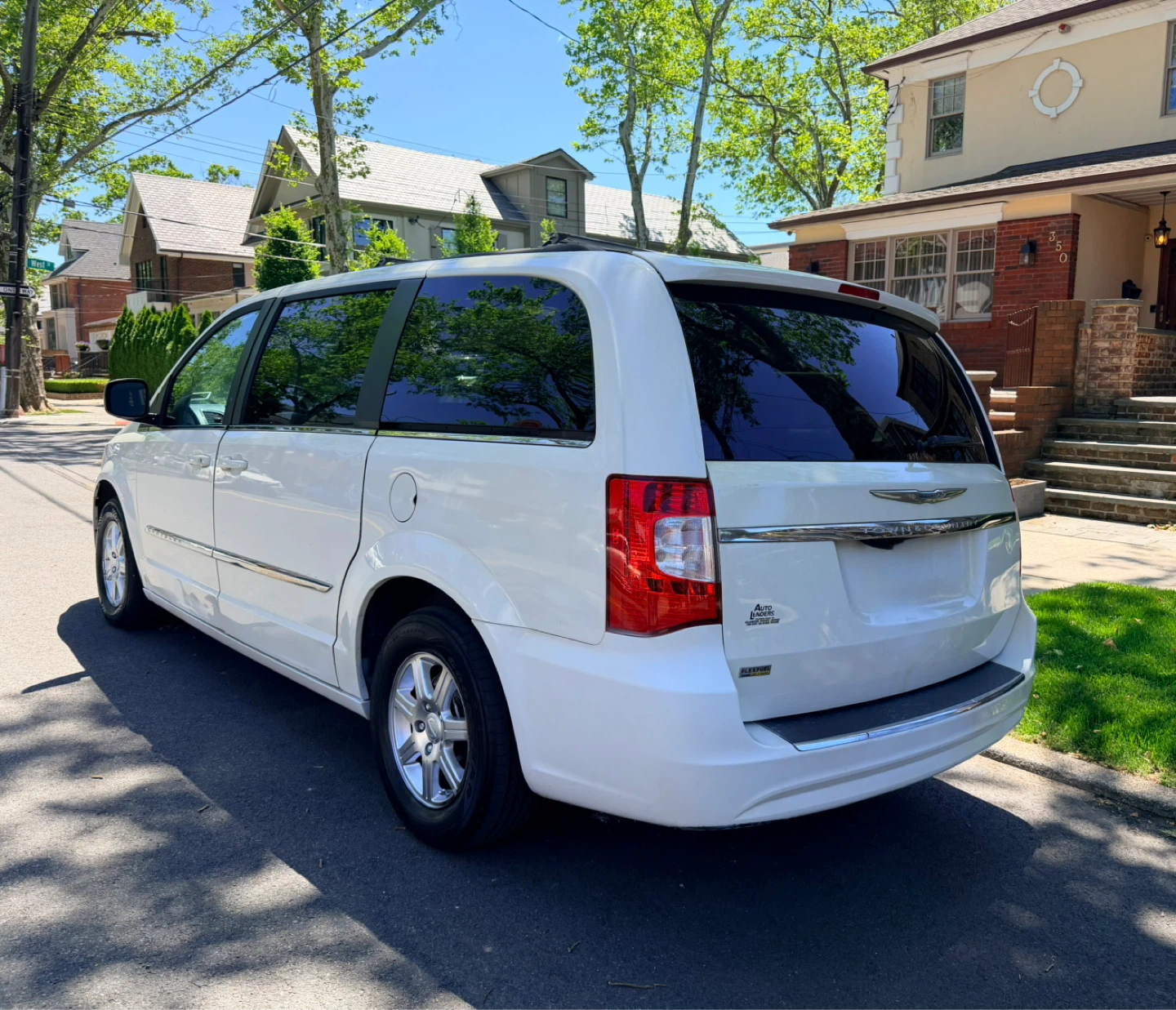 White Chrysler Town & Country Minivan - photo 3