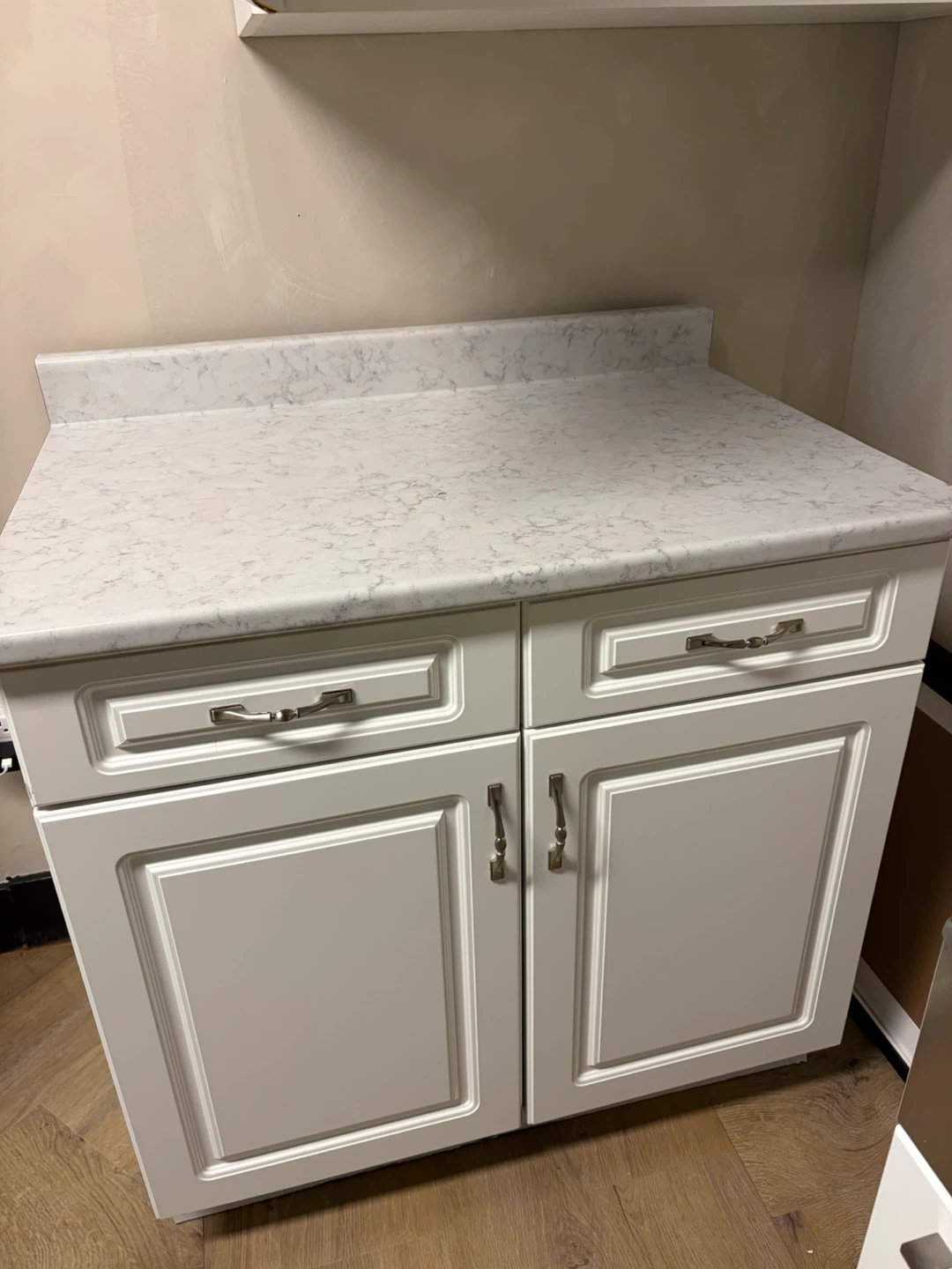 White kitchen cabinet with countertop