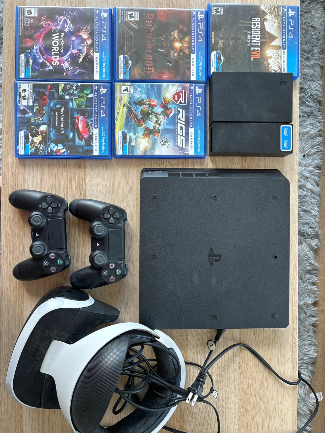 PlayStation 4 Slim Console with VR Headset and Games