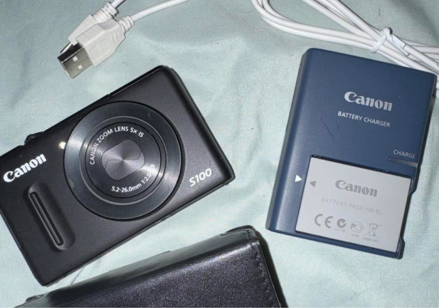 Canon PowerShot S100 Digital Camera with Charger