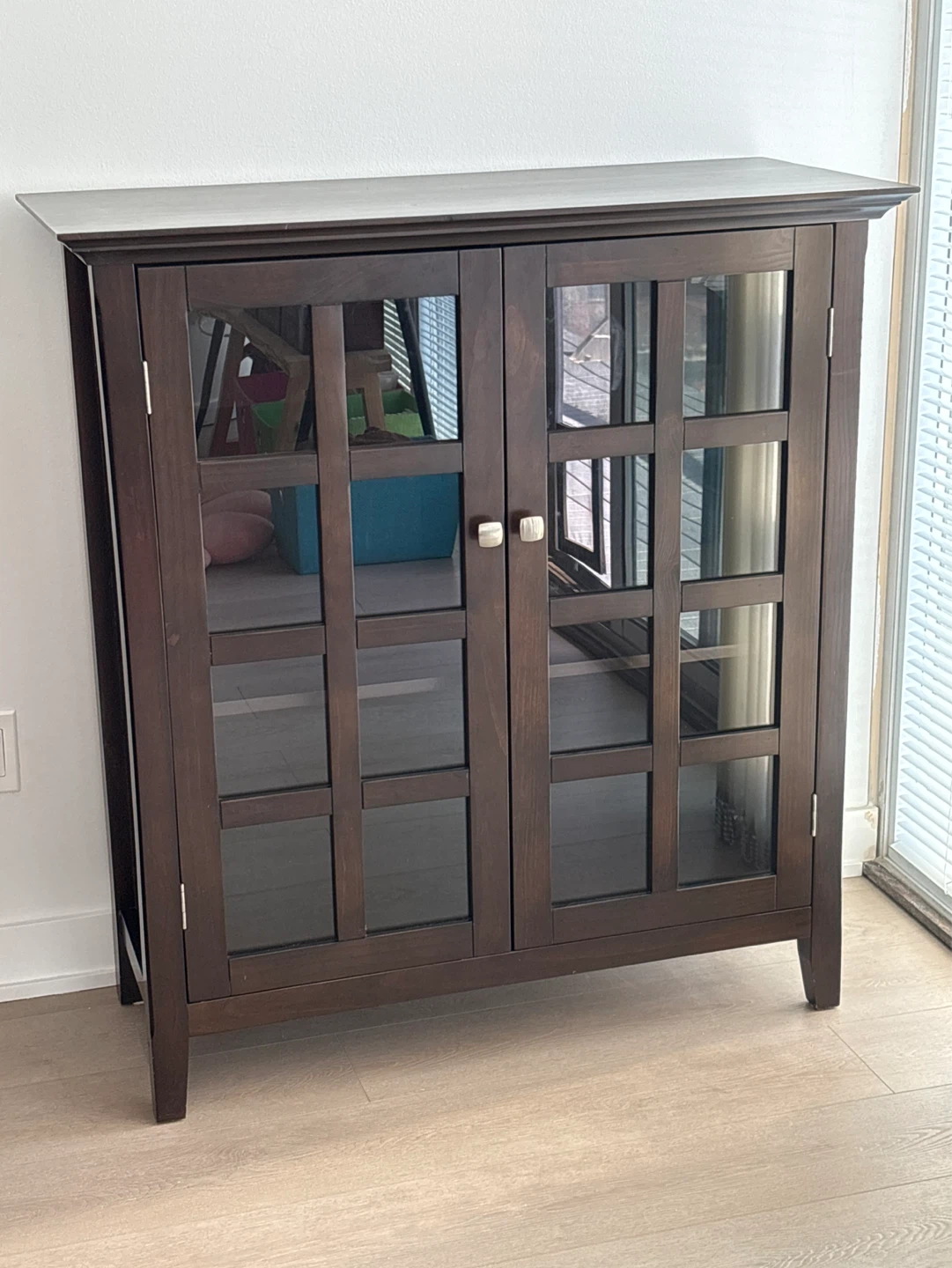 Dark Wood Cabinet with Glass Doors
