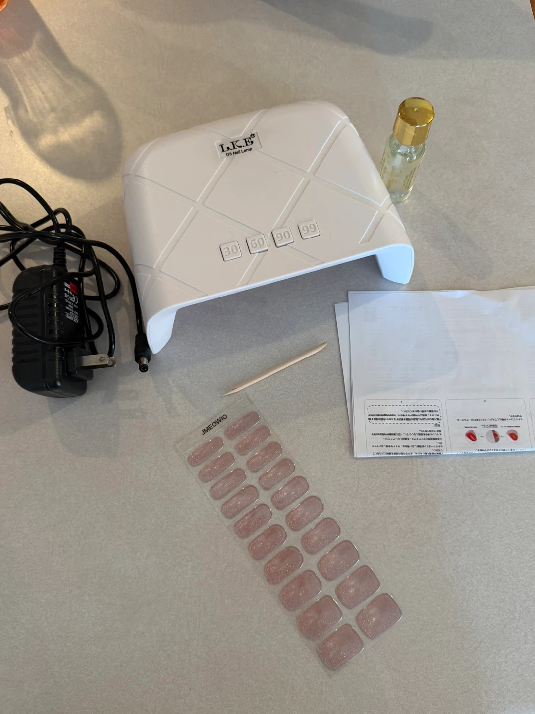 Sally Hansen Vitamin E Oil, LED Nail Lamp, and Nail Stickers Kit