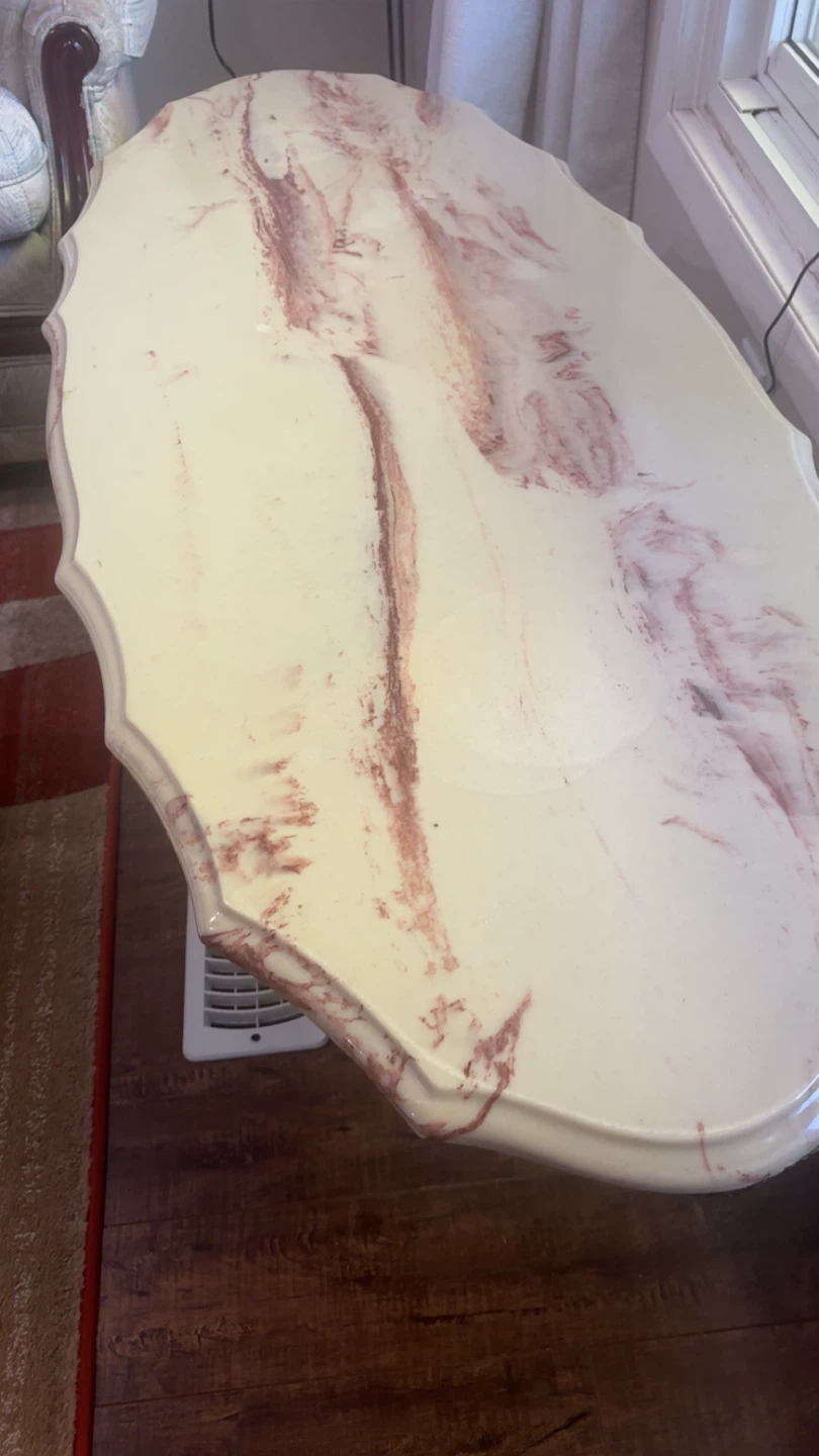 Marble top accent table with ornate legs