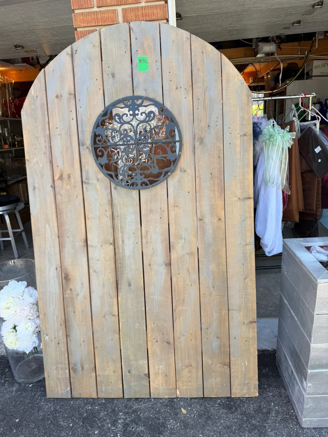 Rustic Wooden Archway with Decorative Metal Insert