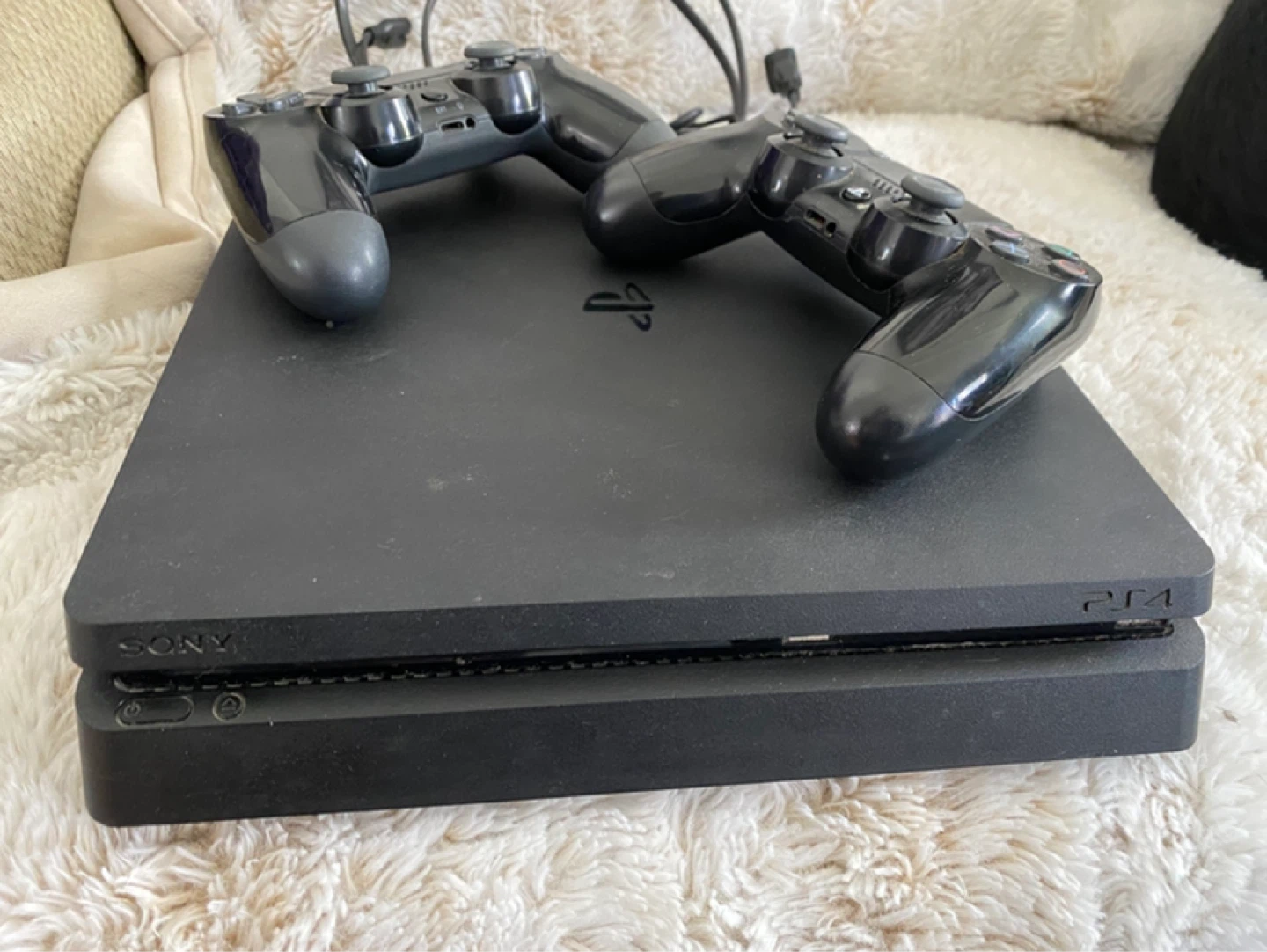 Sony PlayStation 4 Slim Console with 2 Controllers - photo 2