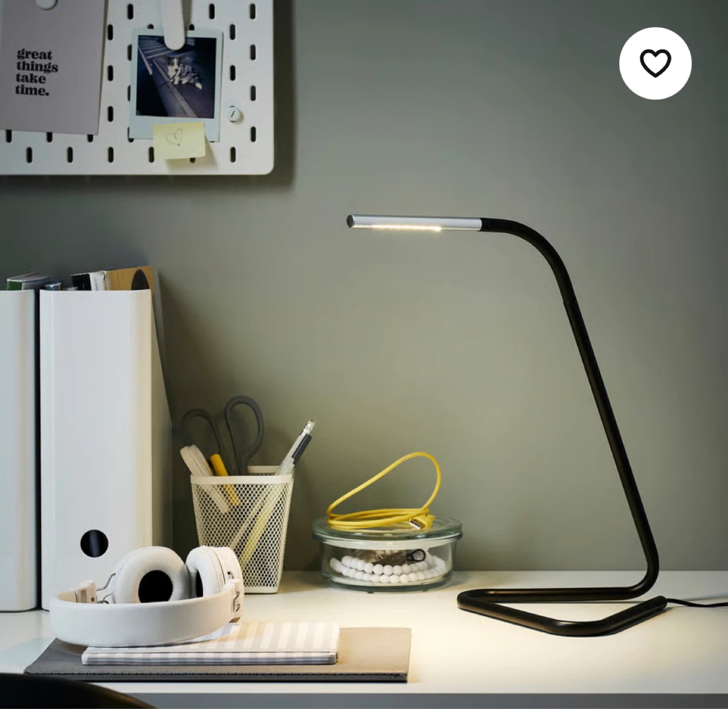 Adjustable LED desk lamp.