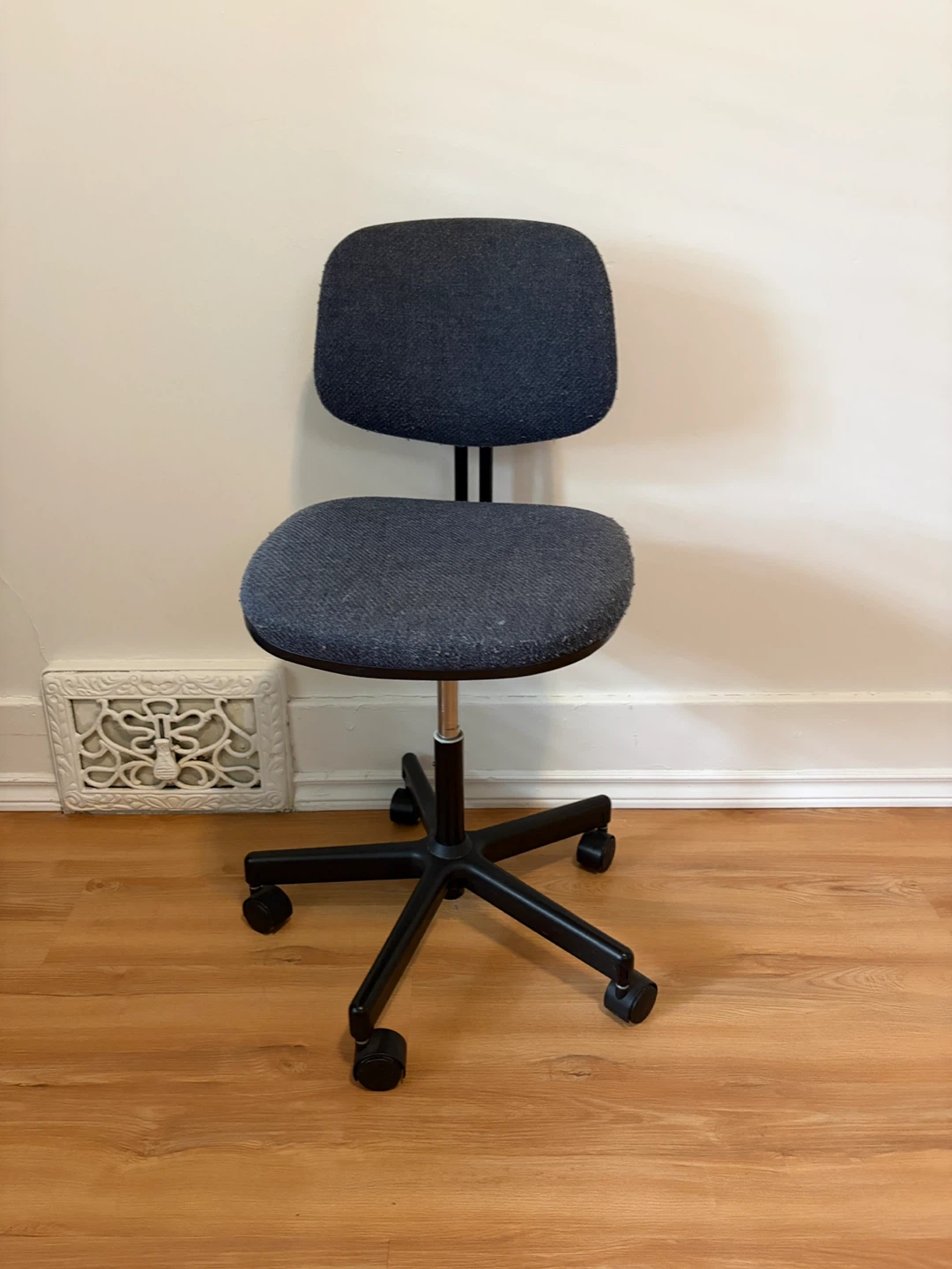 Blue fabric office chair with casters