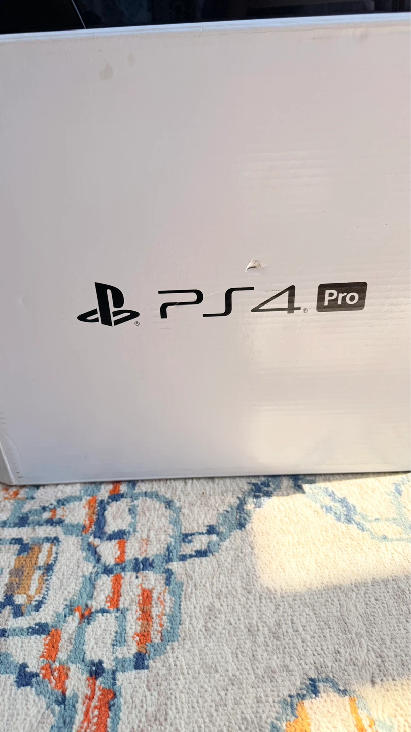 Sony PlayStation 4 Pro with 2 Controllers and Games