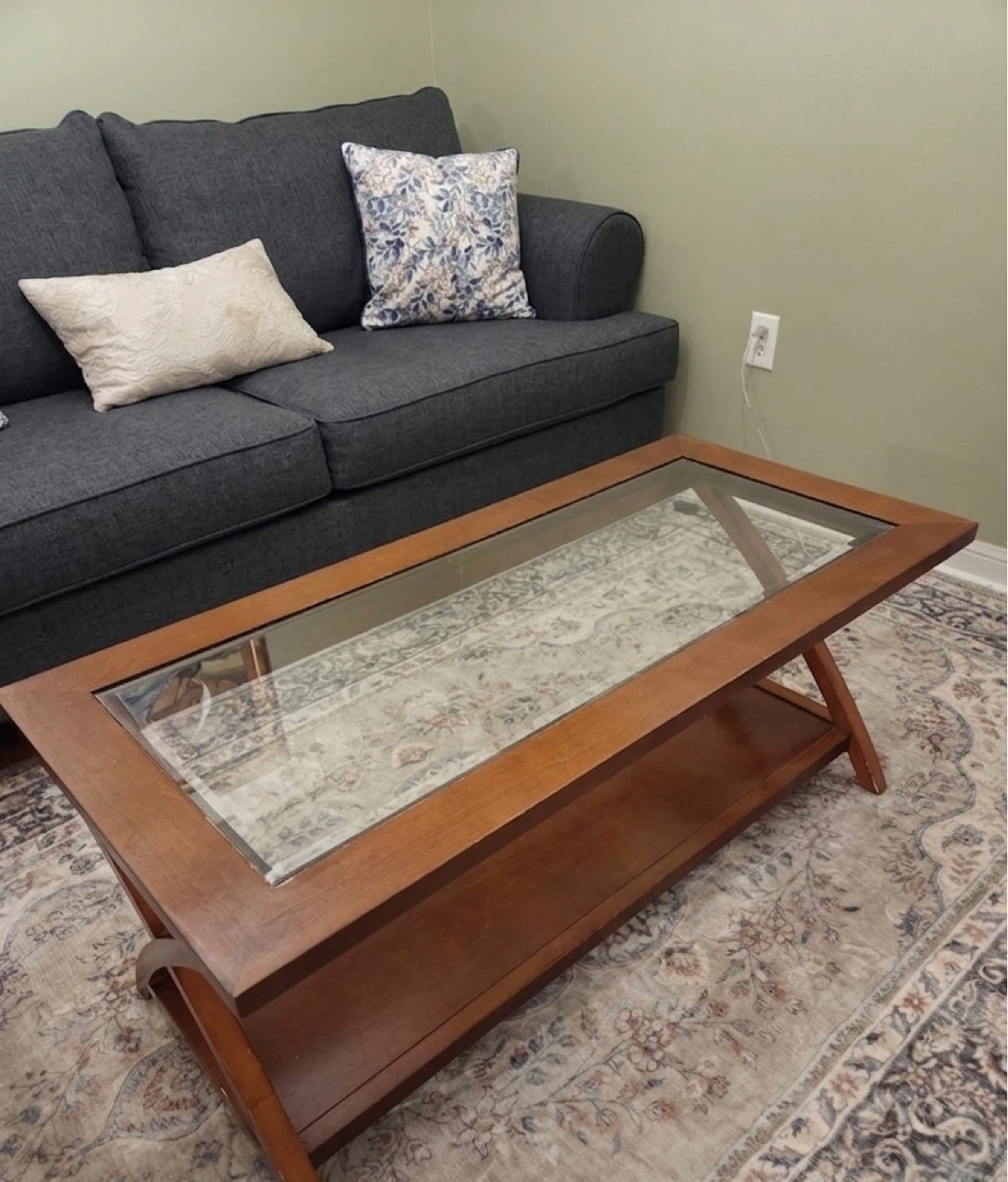 Wooden coffee table with glass top