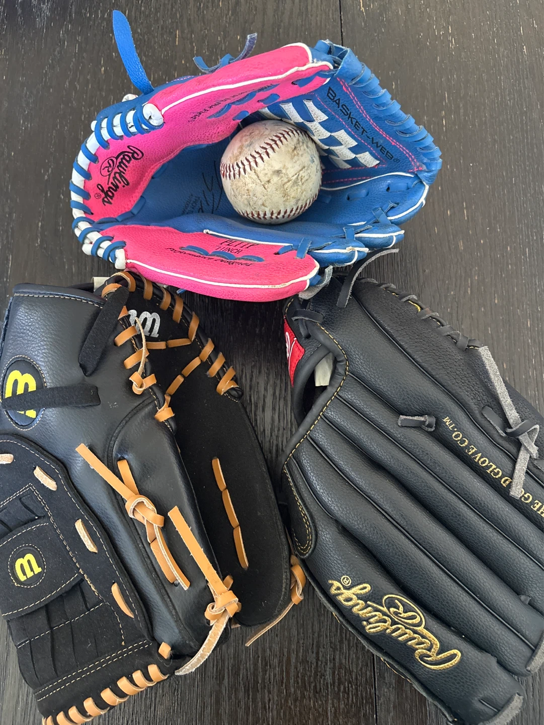 Wilson and Rawlings Baseball Gloves with Baseball