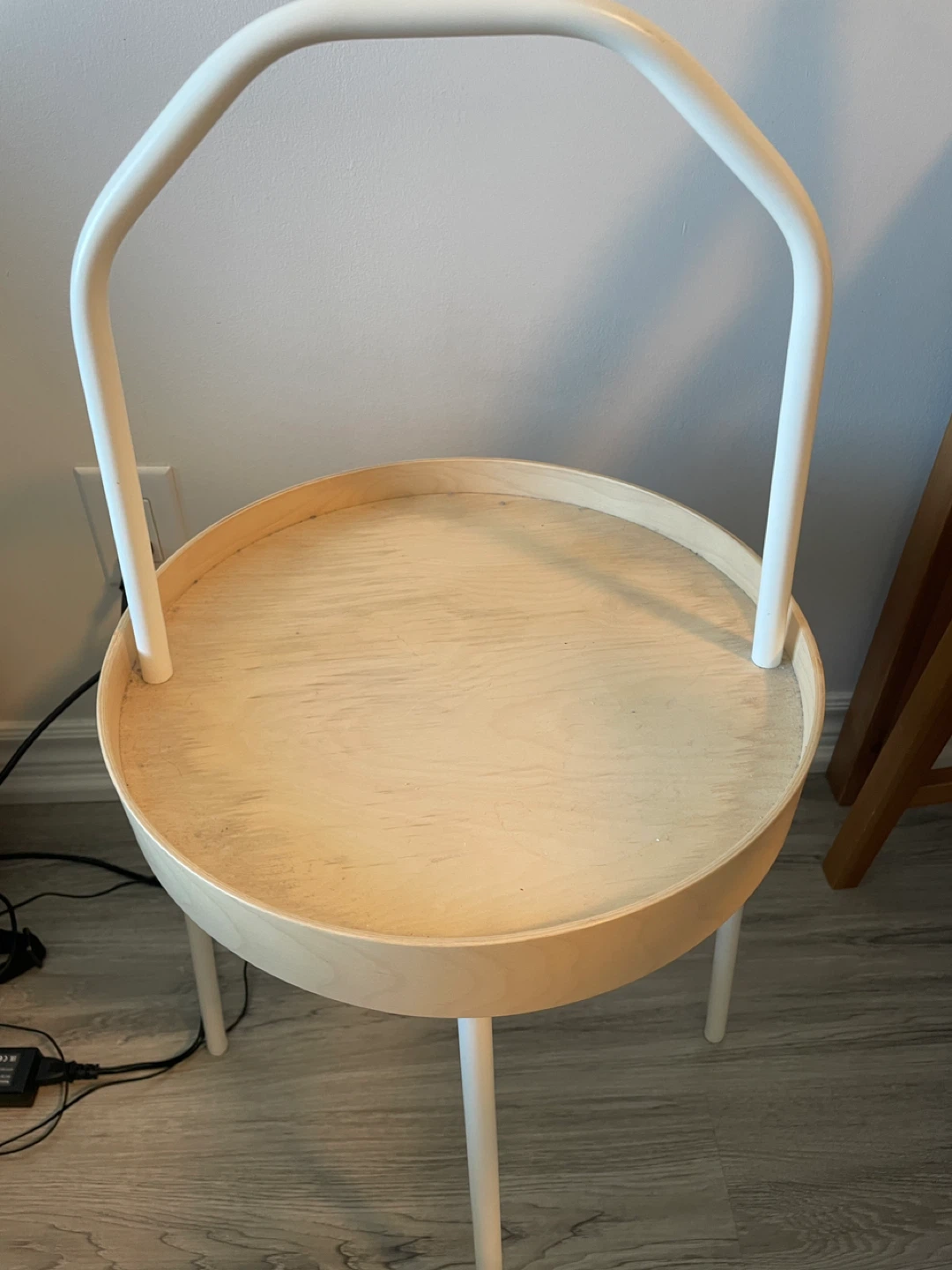 Round wooden side table with white frame