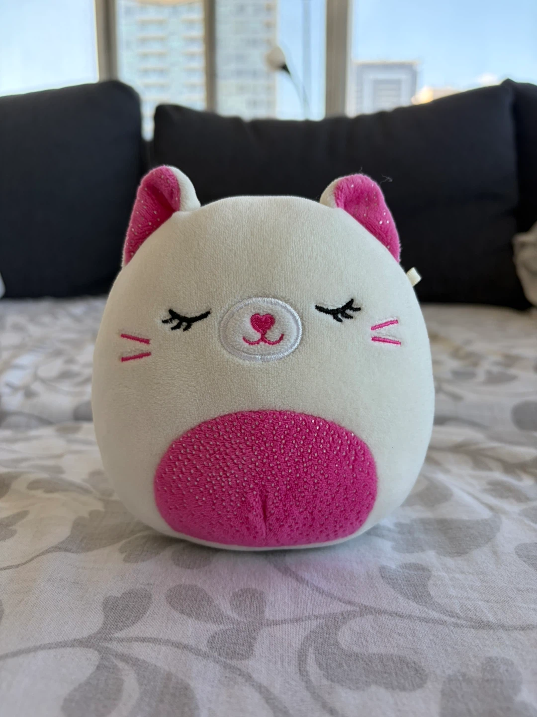 Squishmallows Carmen the Pink and Cream Cat.