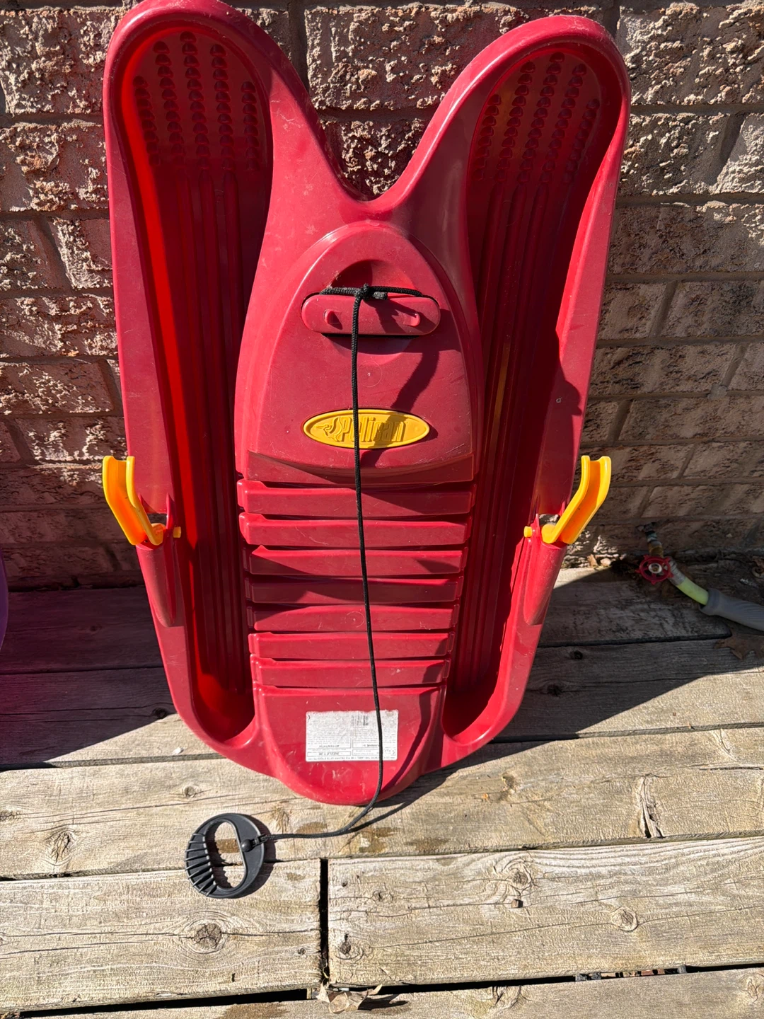 Red Toboggan Sled with Rope and Handle