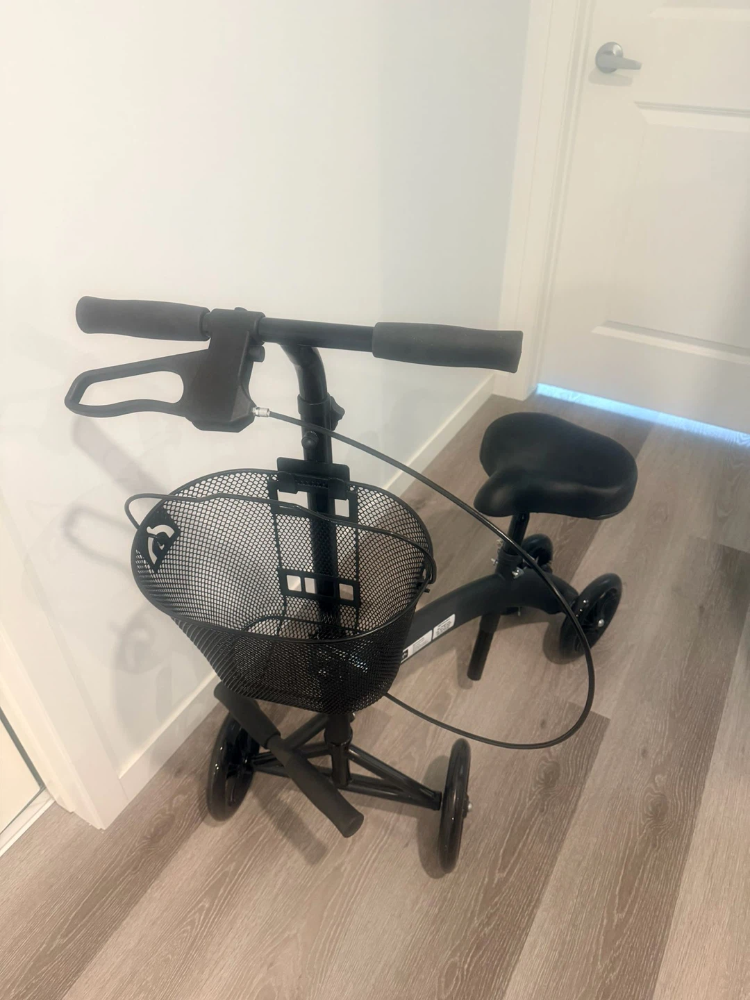 Black seated Scooter with Basket