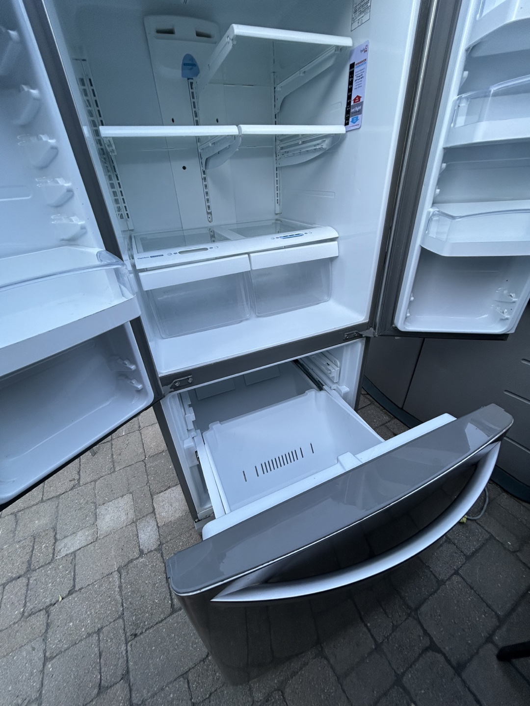 LG Stainless Steel French Door Refrigerator and Glass Top Stove - photo 2