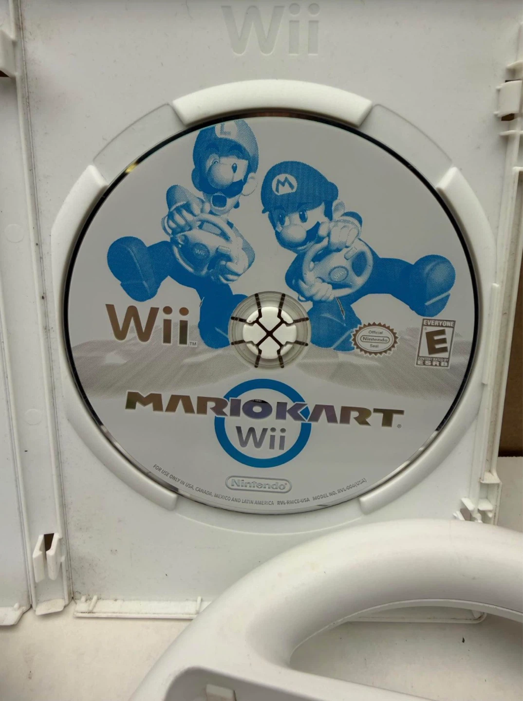 Nintendo Wii Mario Kart Game and 2 Steering Wheels