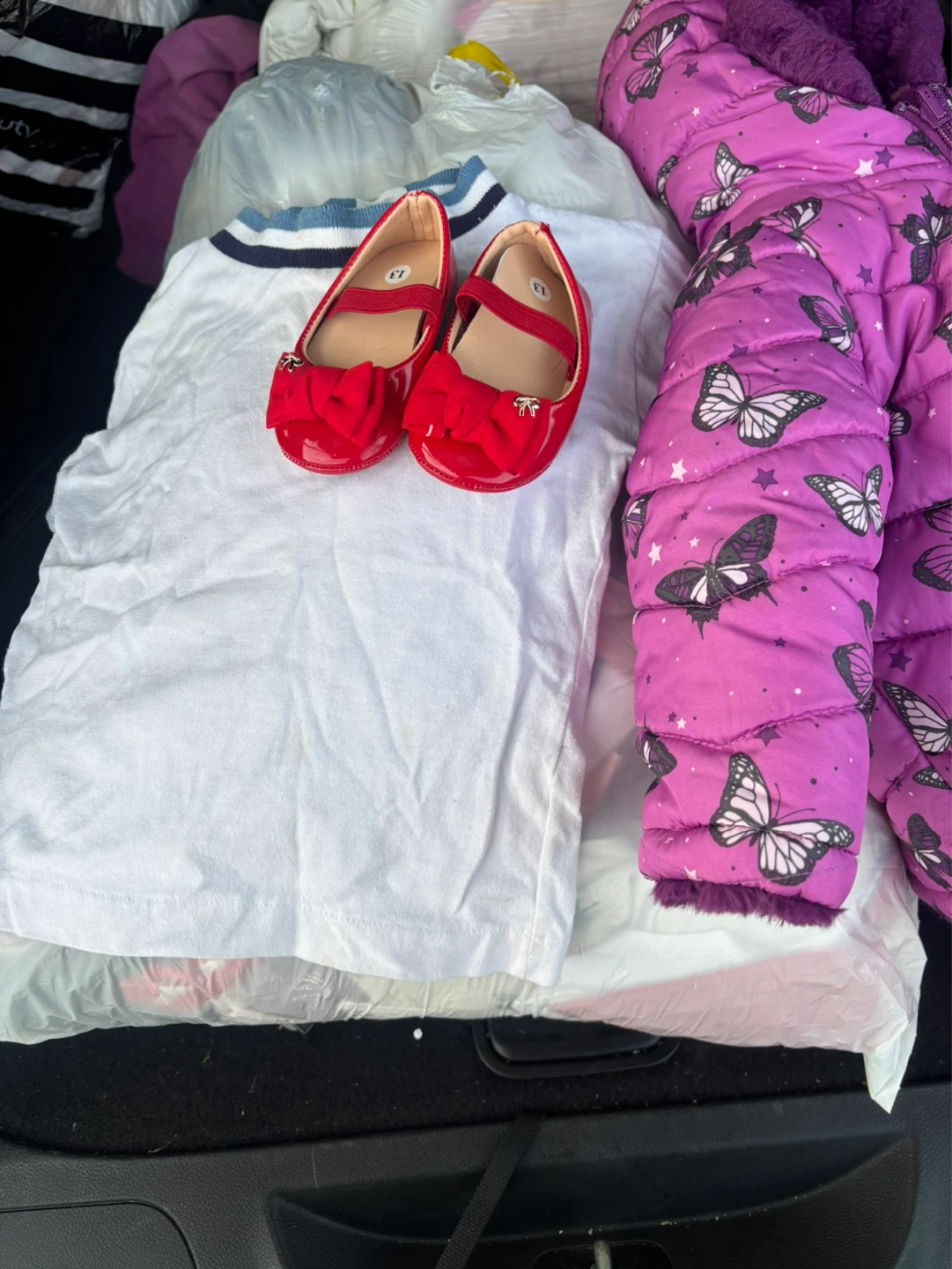 Bag with girls' clothes from 12 to 18 months