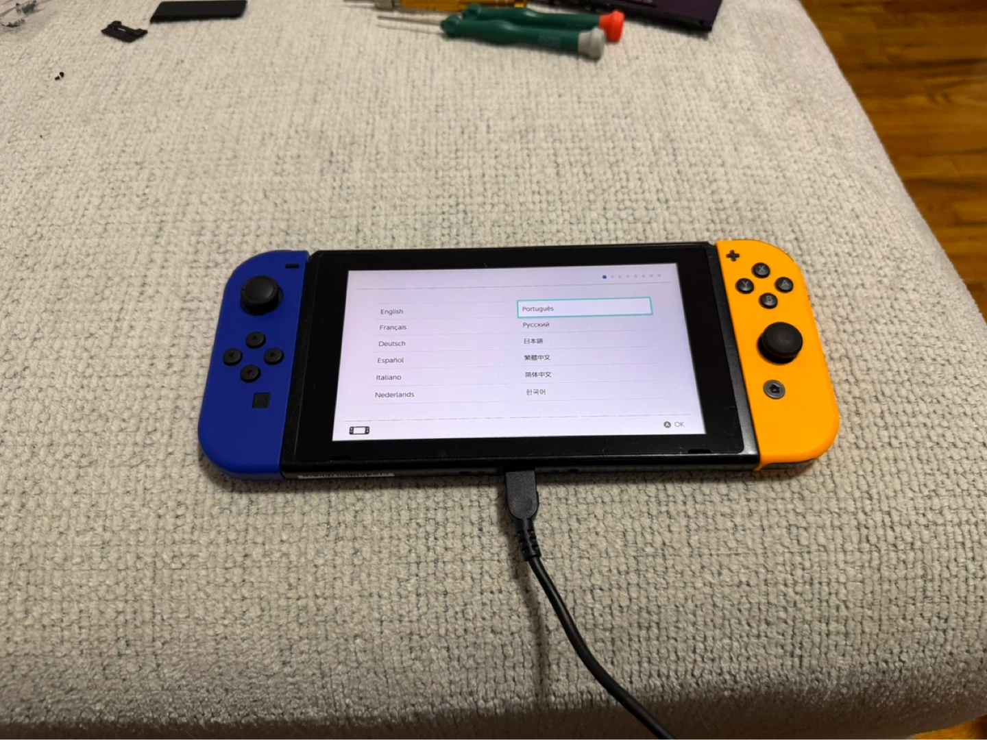 Nintendo Switch Console with Blue and Orange Joy-Cons