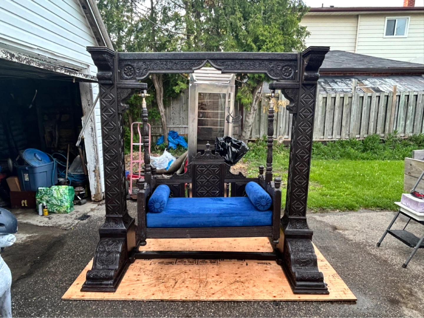 Ornate Wooden Indoor/Outdoor Swing Chair with Blue Cushion - photo 2