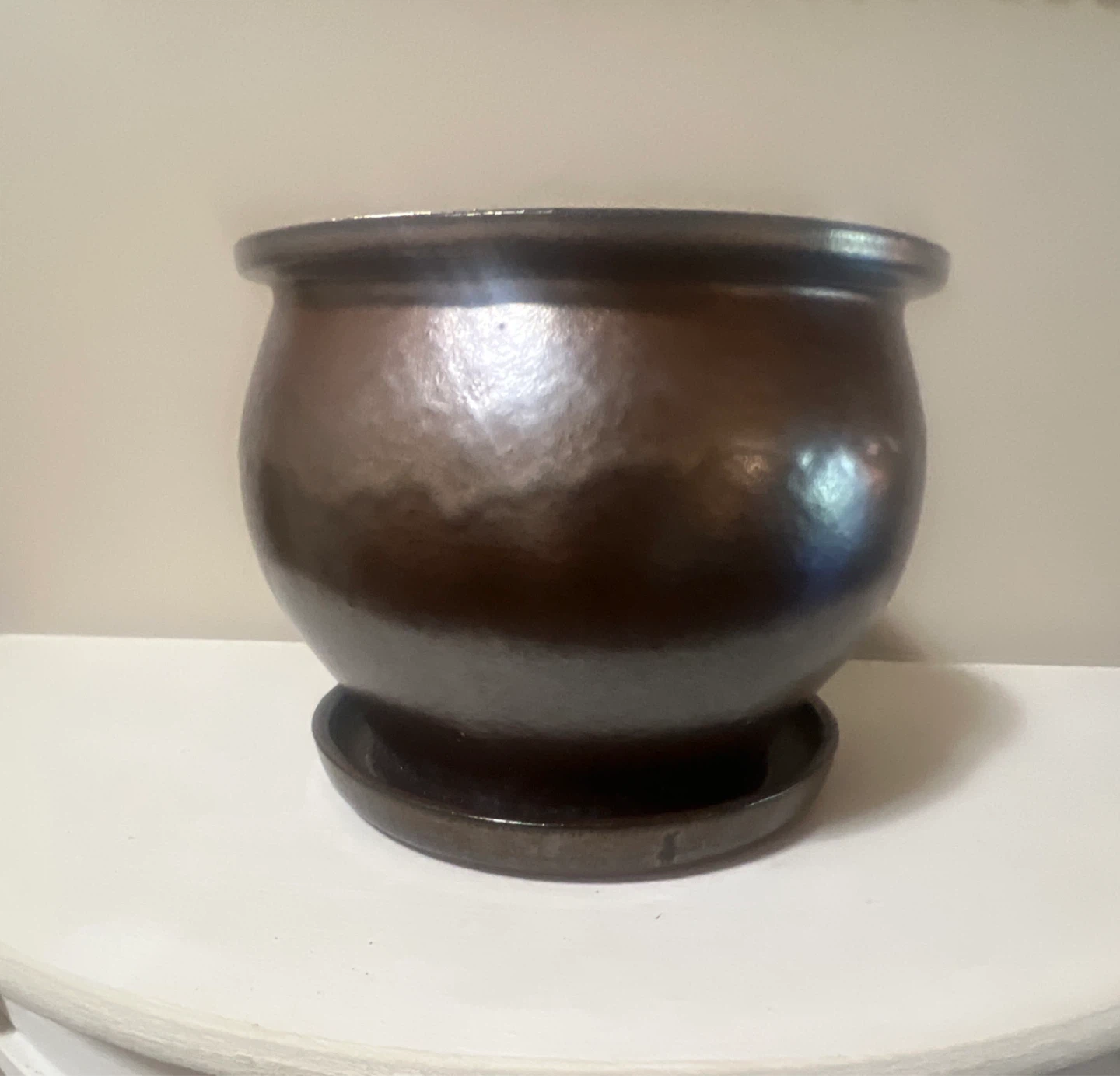 Brown ceramic planter pot with saucer