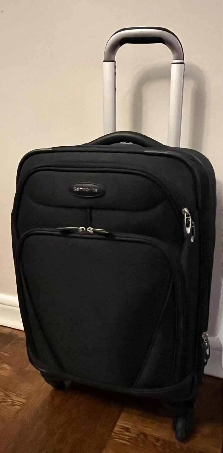 Samsonite Black Rolling Suitcase