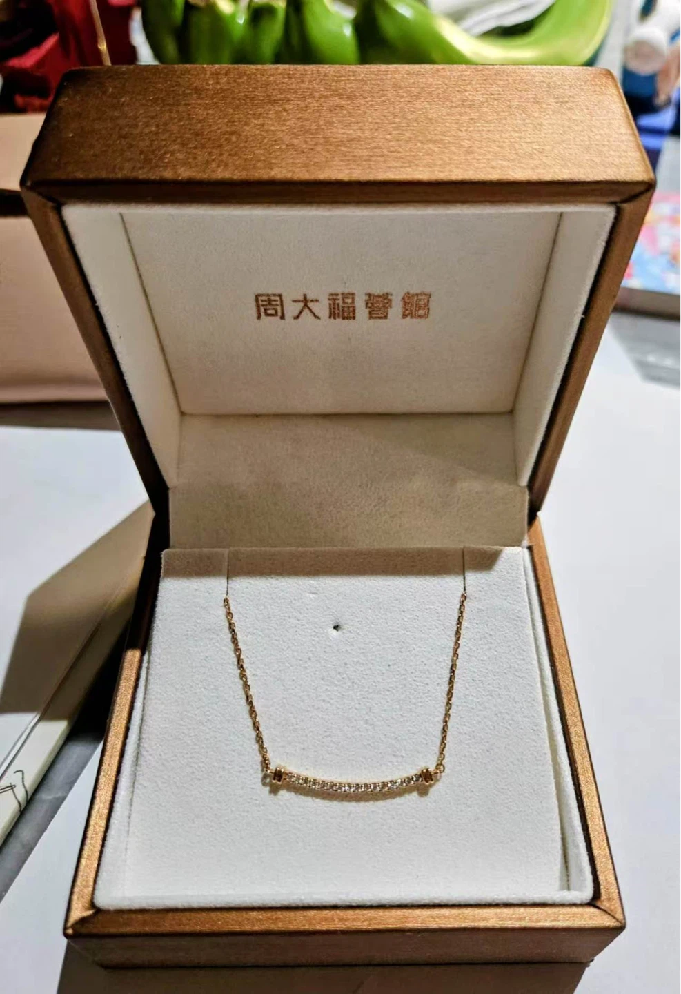 Diamond bar necklace is from the jewelry brand Chow Tai Fook - photo 2