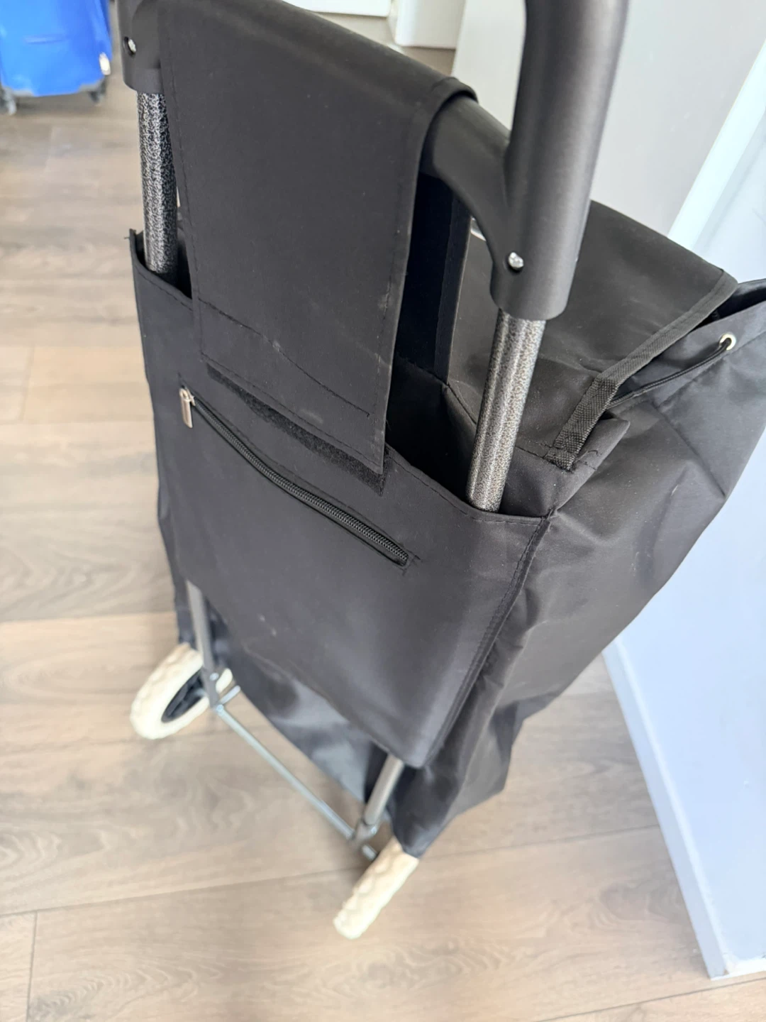 Black shopping trolley with wheels