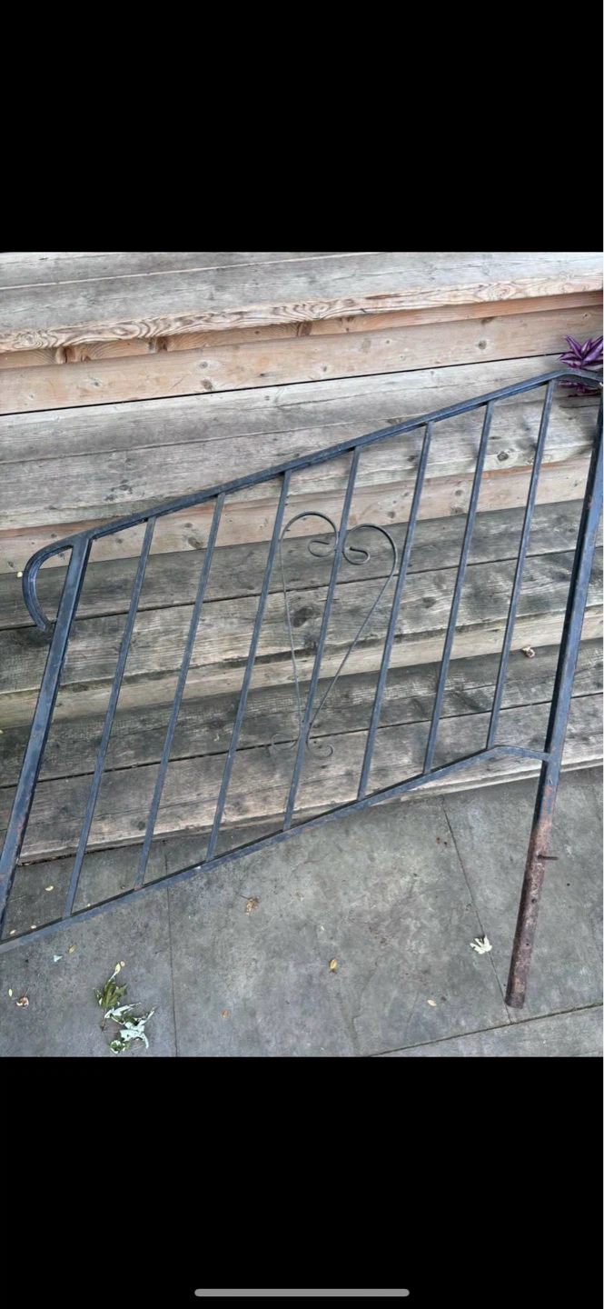 Black Metal Stair Railing with Heart Accent