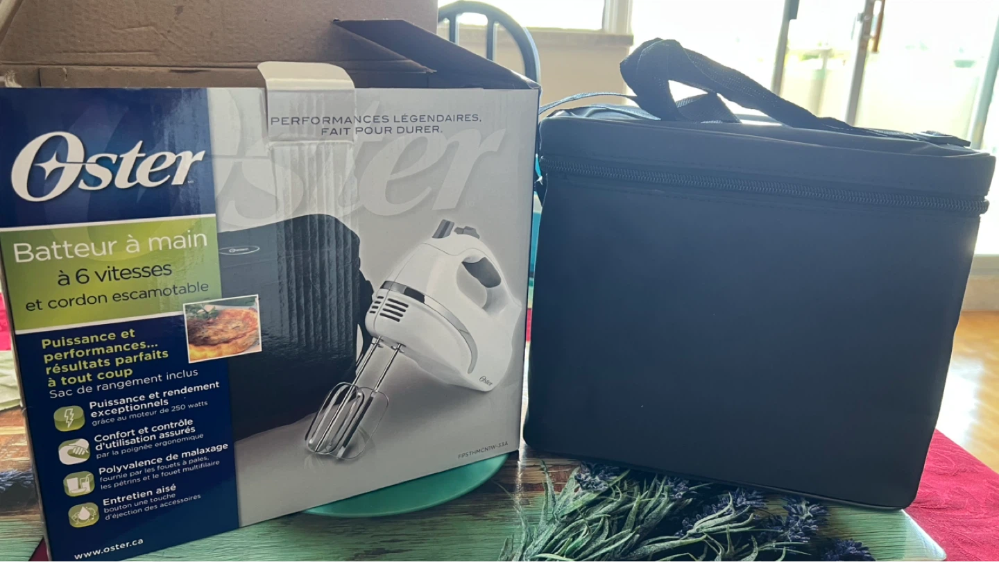 Oster 6 Speed Retractable Cord Hand Mixer with Storage Bag