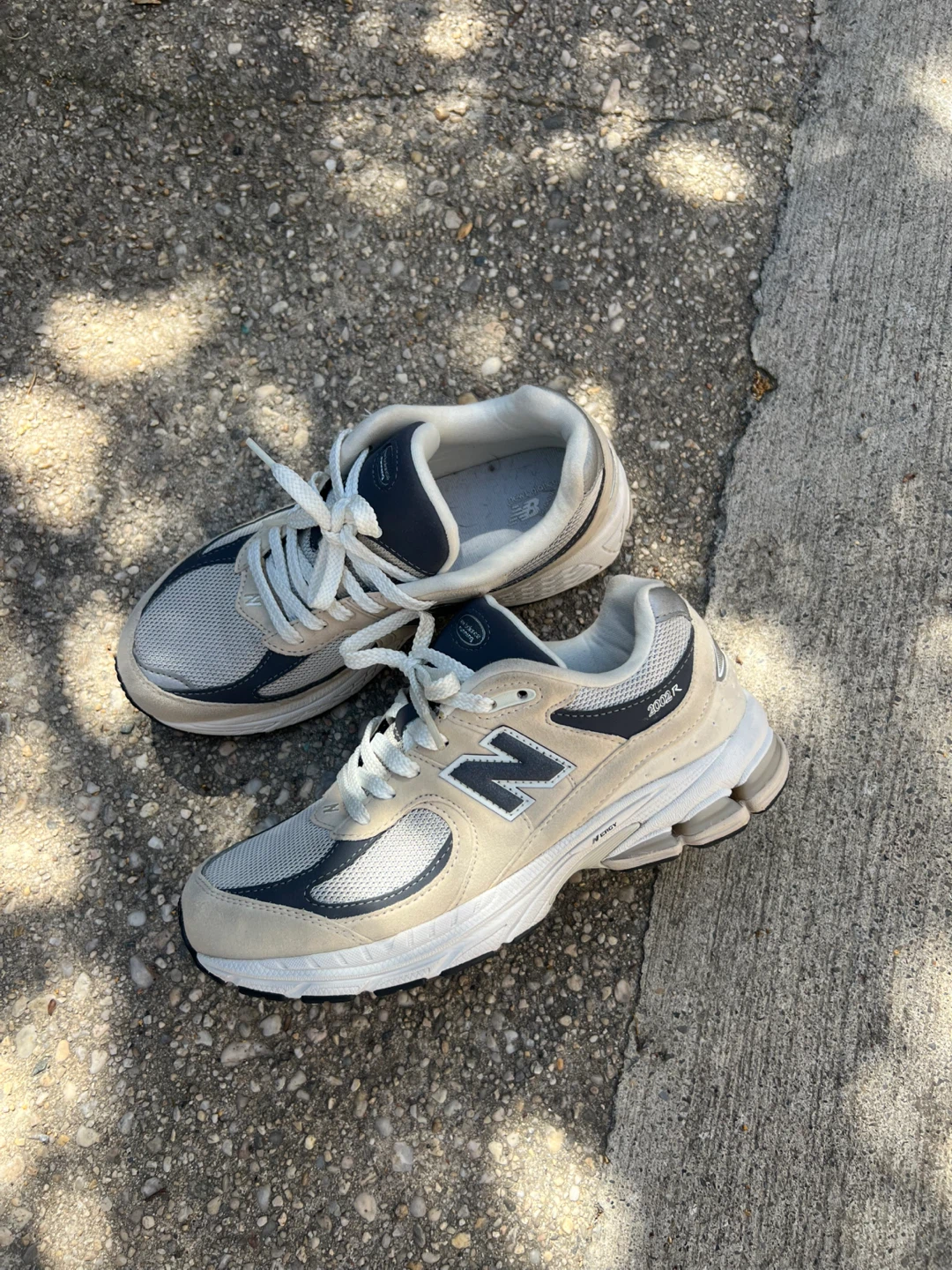 New Balance 2002R beige navy sneakers