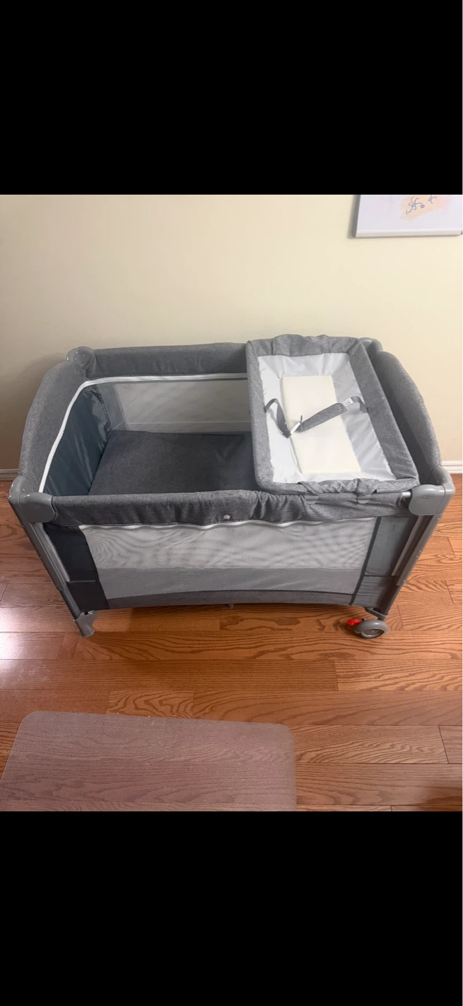 Play/Sleep Crib with Diaper Changer and Two-Level Floors