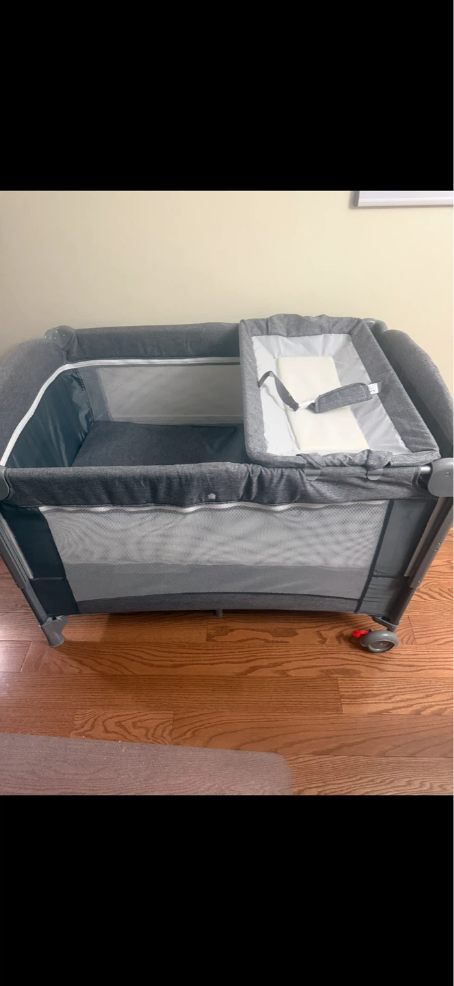 Play/Sleep Crib and with a Diaper Changer and Two-Level Floors