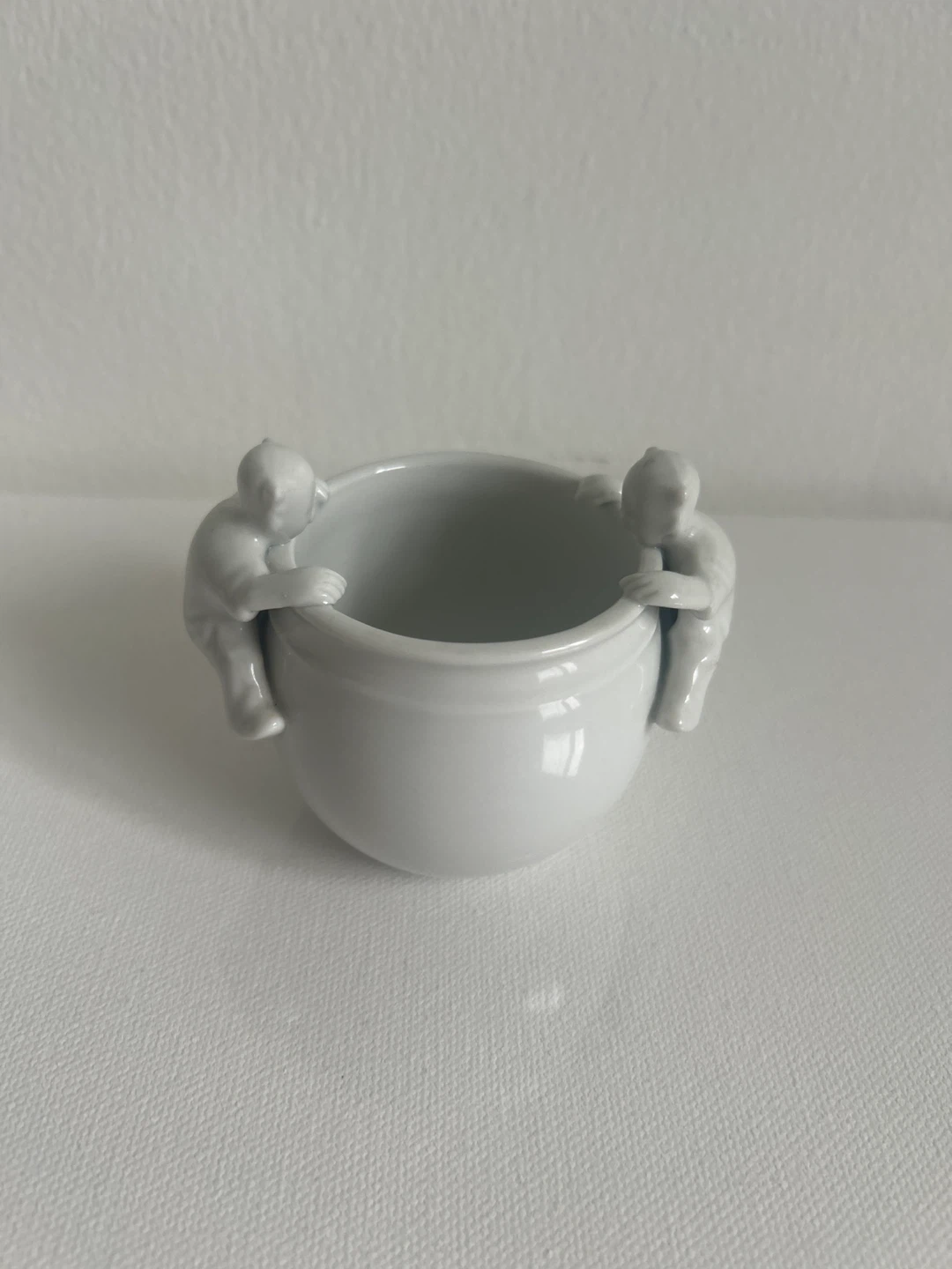 White Ceramic Pot with Climbing Figures