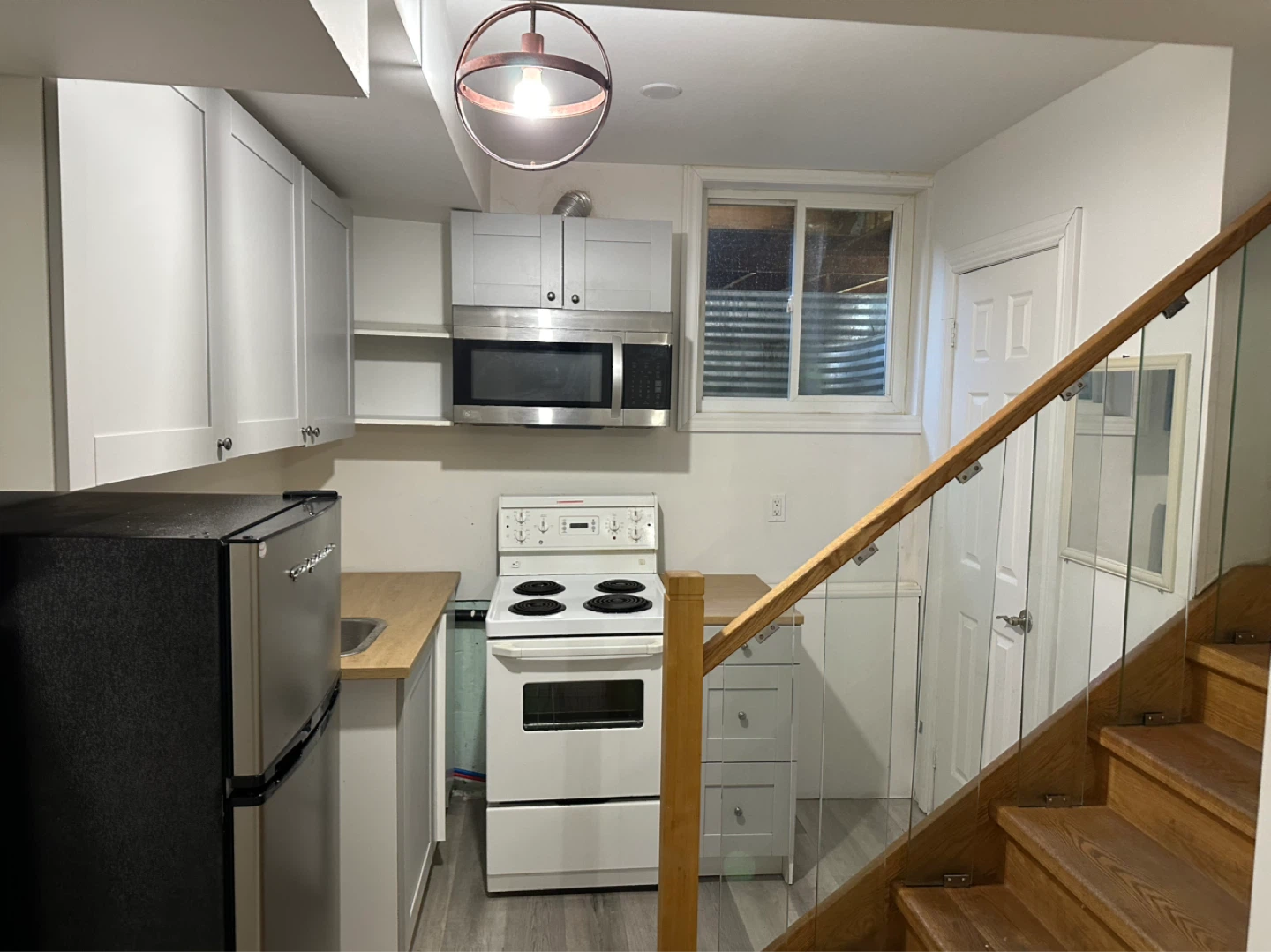 Basement Apartment with Kitchenette and Bedroom - photo 3