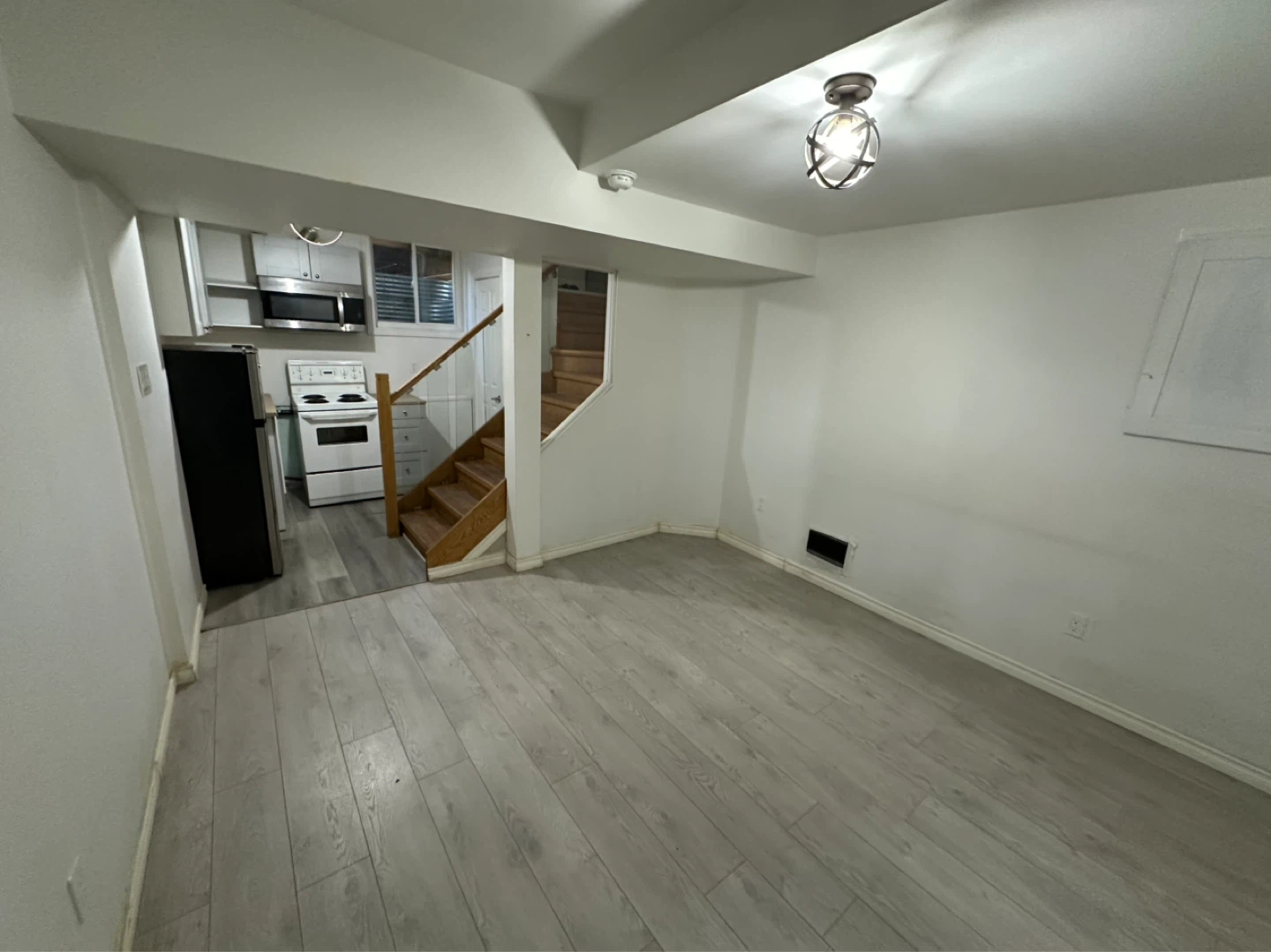 Basement Apartment with Kitchenette and Bedroom - photo 5