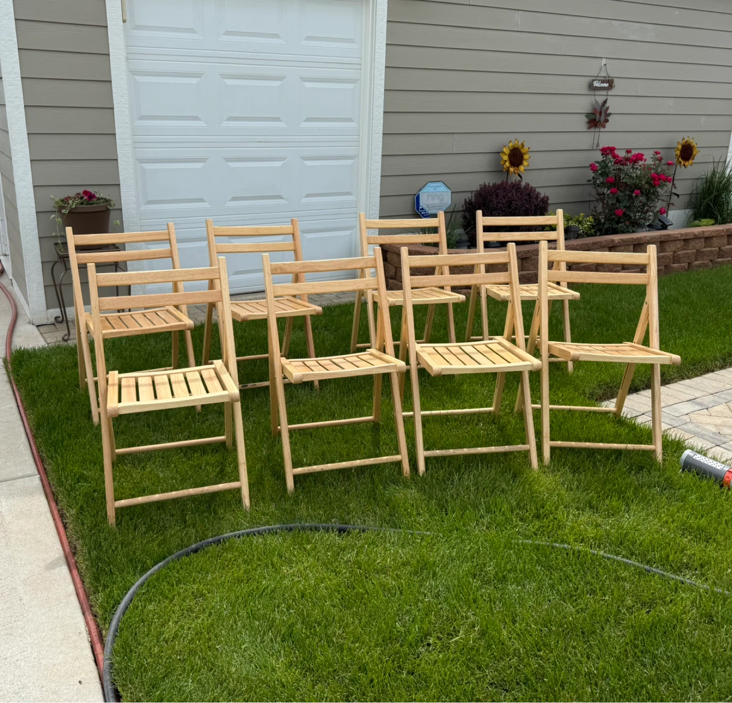 SET OF 8 FOLDABLE WOODEN CHAIRS. $150.00 OR BEST OFFER.