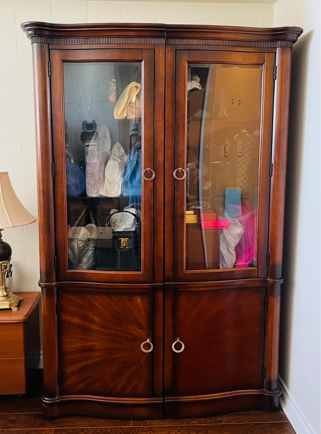 Wood display beautiful cabinet with glass doors.