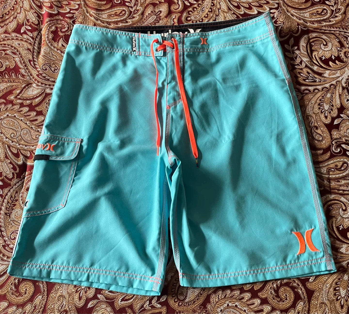 Hurley Board Shorts Teal w/ Coral Trim, Men’s size 34” waist.