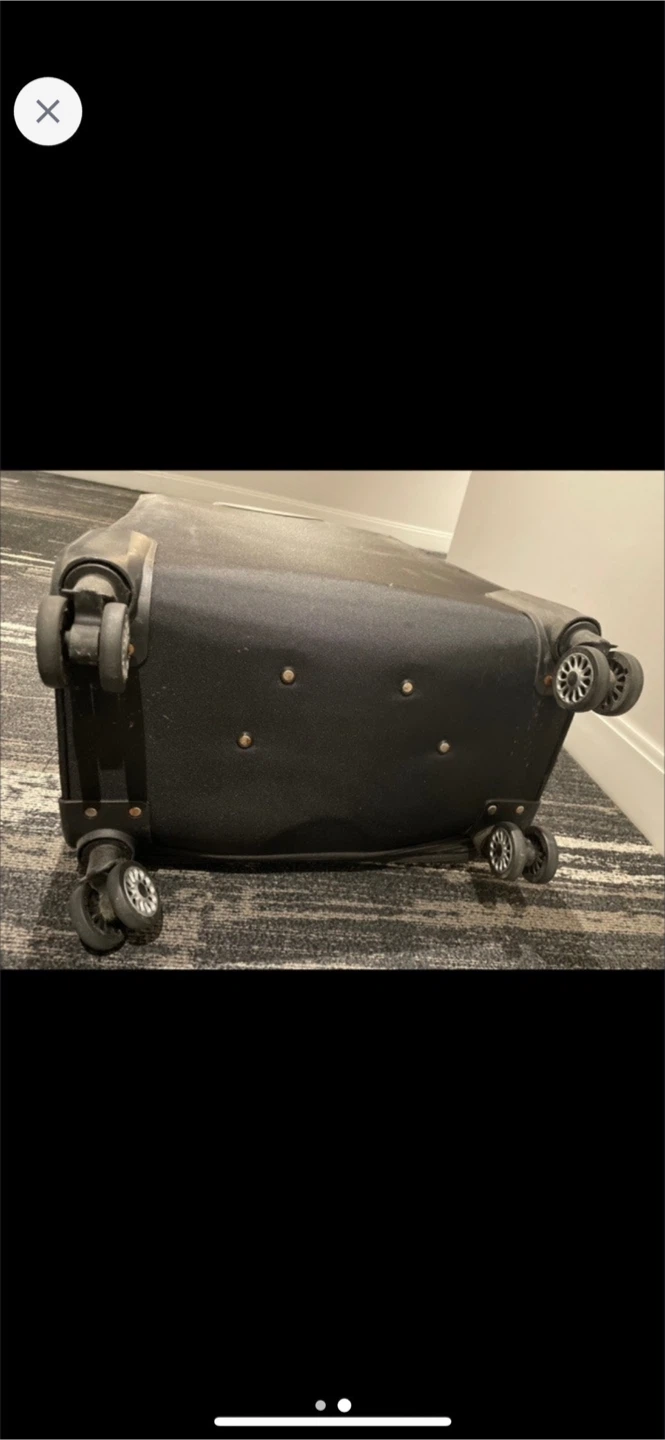 Like new Duffle bag and Black 28" largest check in Suitcase