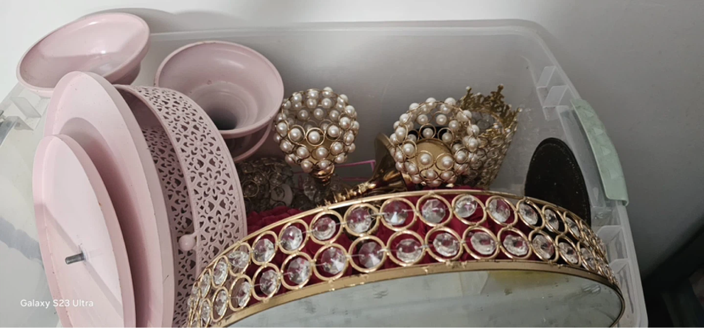 Pink decorative tray with pearl accents and candle holders