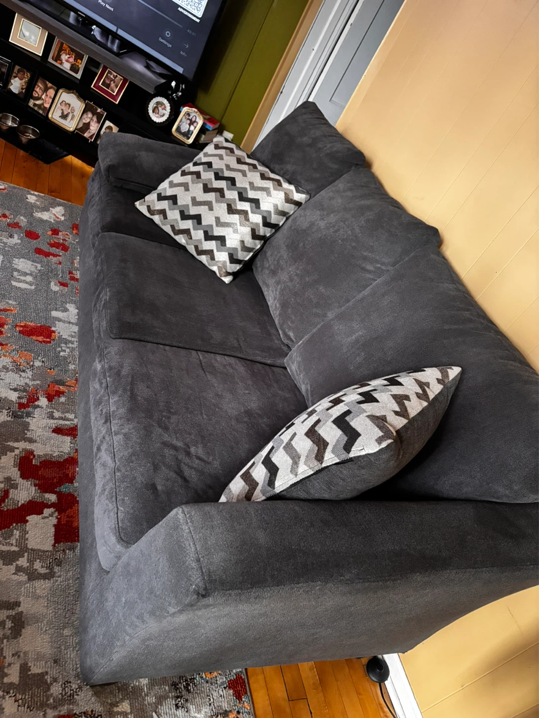 Dark Gray Sectional Sofa with Pillows