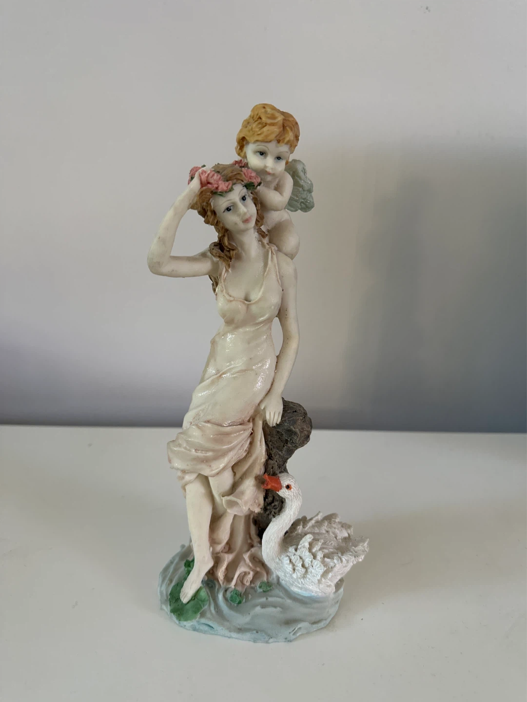 Figurine of a Woman with Cherub and Swan